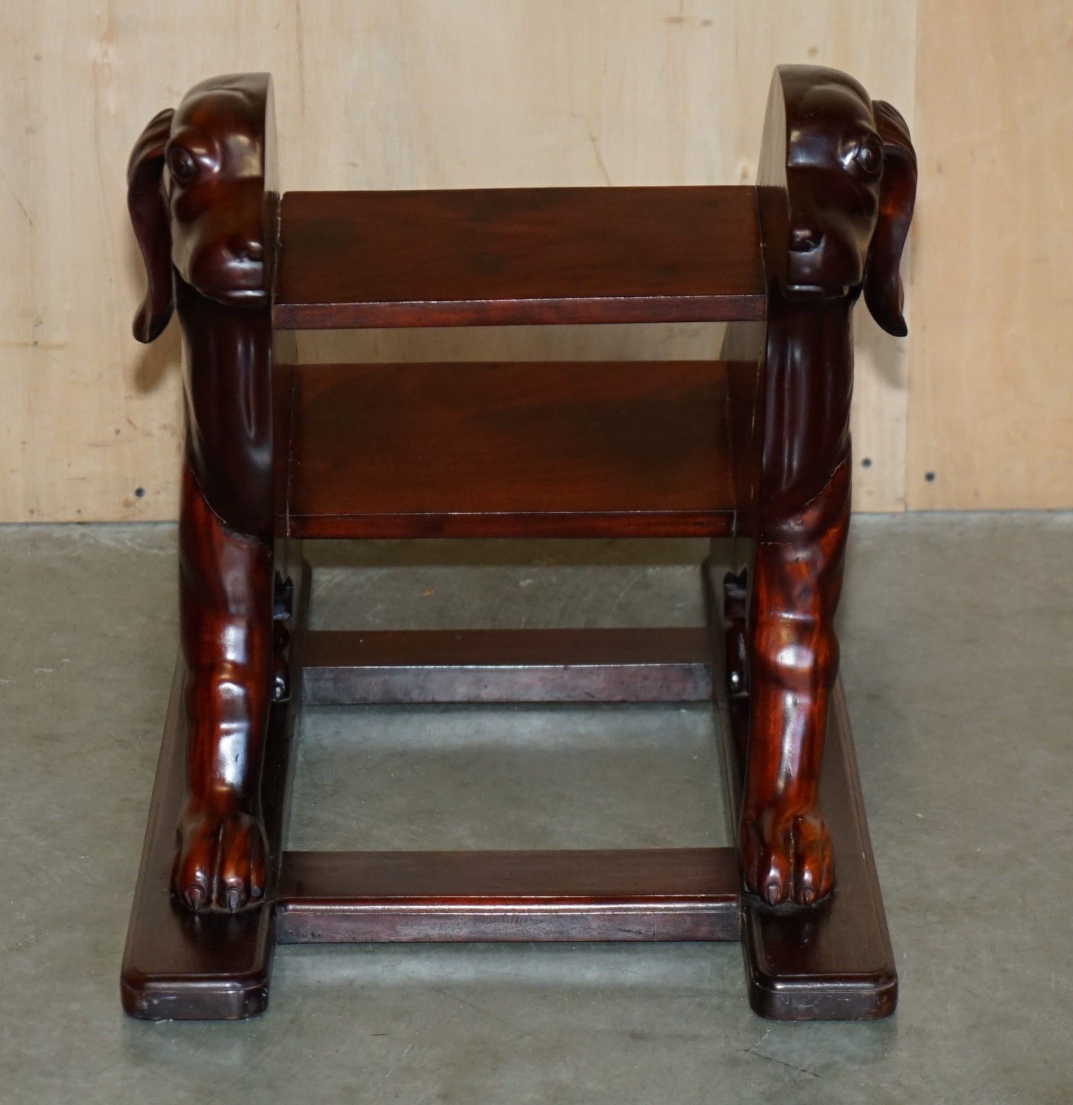 Pair Of Deep Mahogany Library Steps Depicting Ornately Carved Dogs To The Sides photo for sale