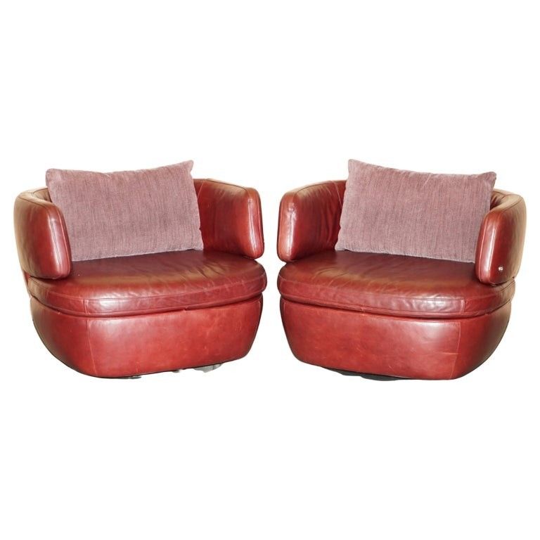Pair Of Exquisite Bordeaux Leather Natuzzi Swivel Armchairs With Lumbar Cushions