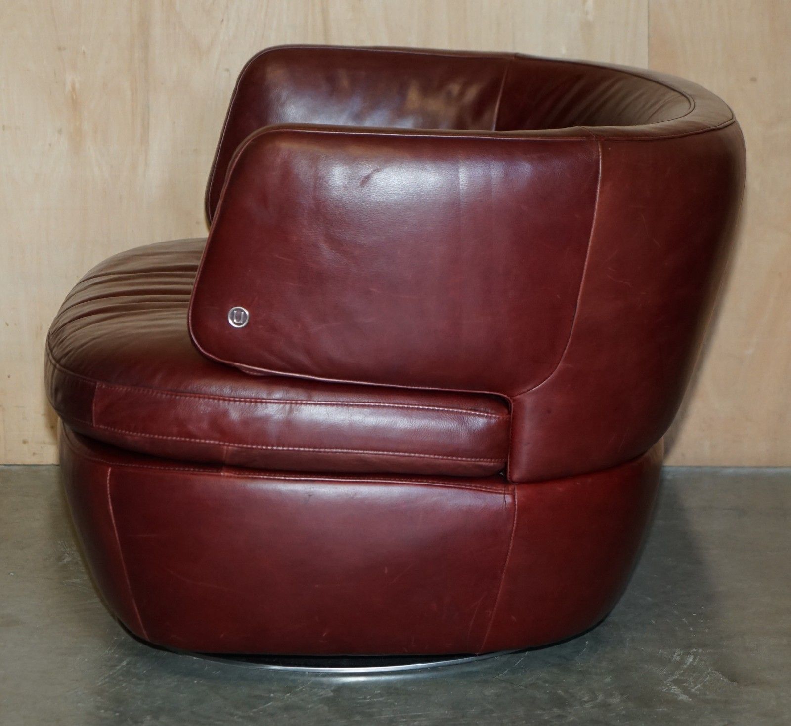 photo buy Pair Of Exquisite Bordeaux Leather Natuzzi Swivel Armchairs With Lumbar Cushions