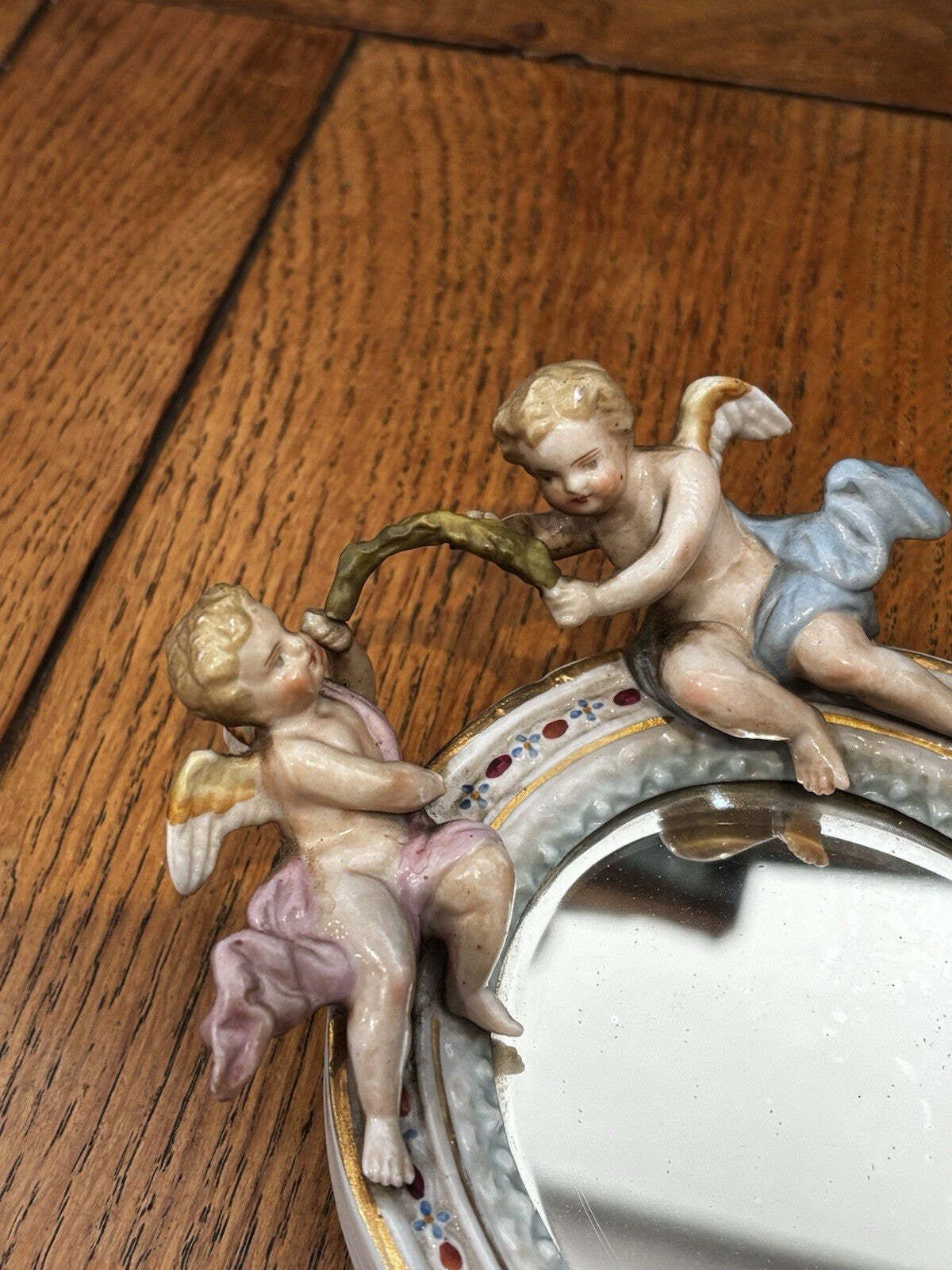 Pair Of Small Winged Cherub Porcelain Wall Mirrors, German, Possibly Meissen photo vinterior