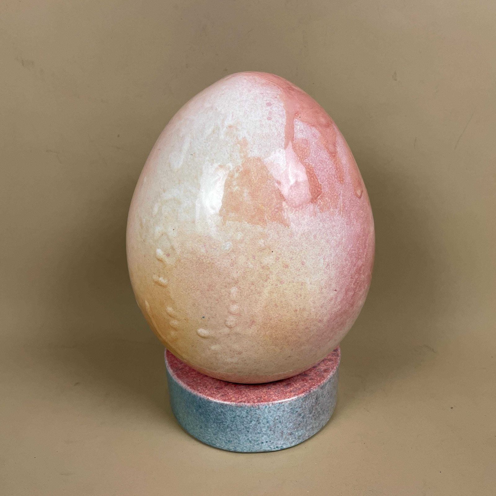Large Ceramic Egg Sculpture Pink Raku Style Glazed Art Ornament With Stand Modern Studio Pottery Egg Decor Pastel Home Accent Contemporary photo furniture