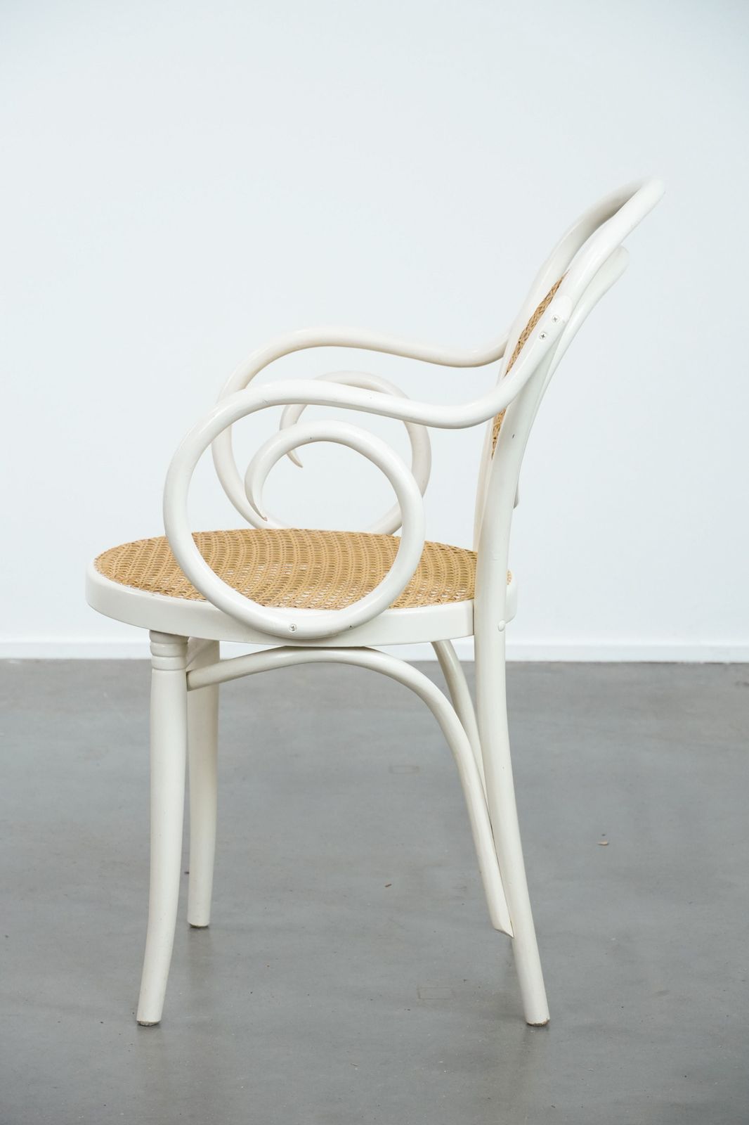 Vintage White Bistro Chair With Armrests In Thonet Style With A Graceful Curved Wooden Frame, Webbing Seat And Backrest photo 171.0