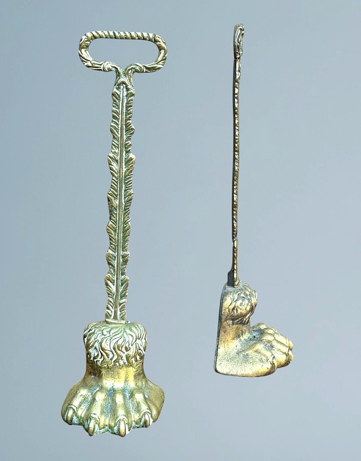 A Near Pair Of 19th Century Brass Lion Paw Door Porters photo furniture