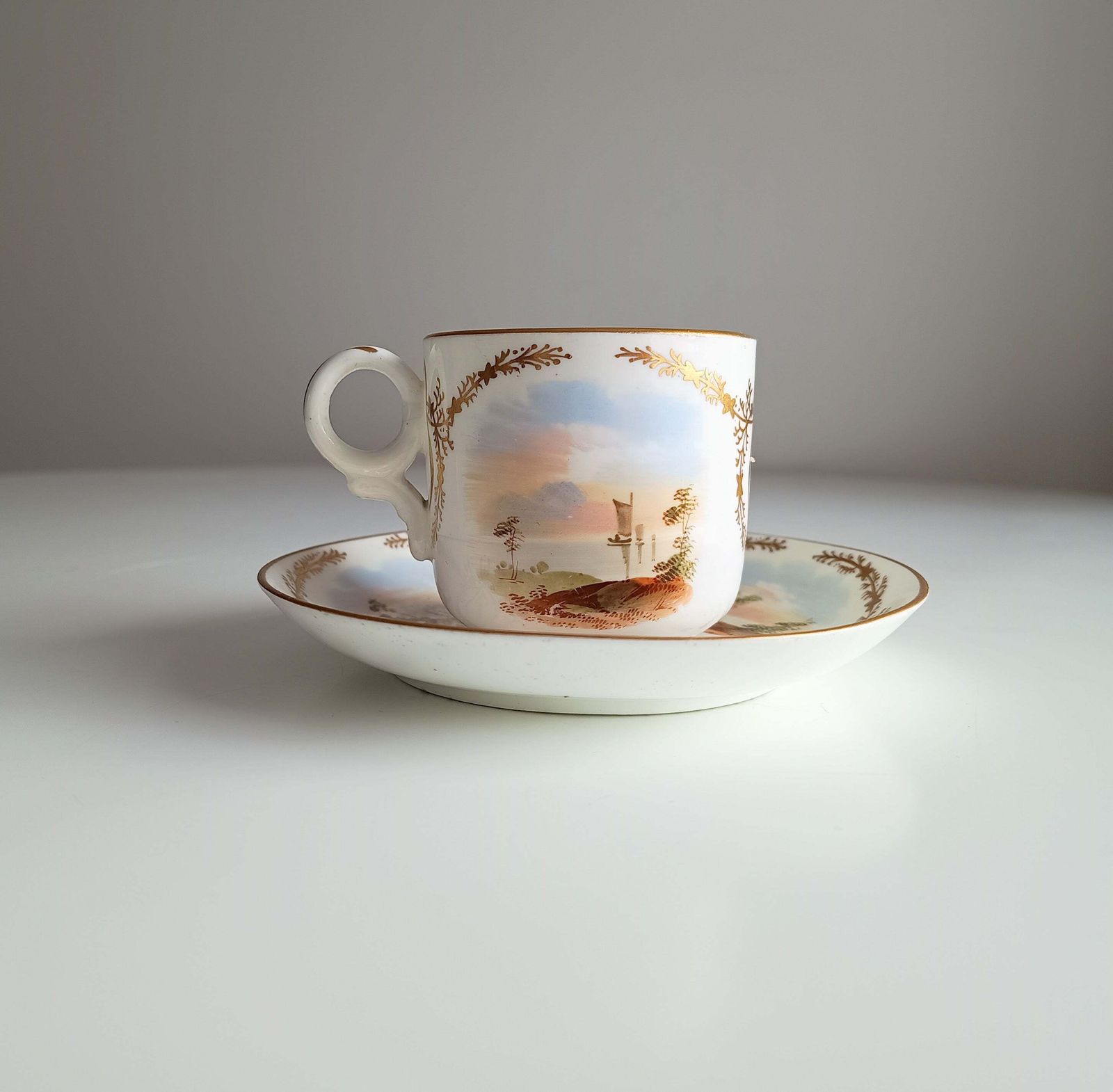 Antique Hand Painted Landscape And Gilt Crests Porcelain Cup & Saucer, Austria 19th Century photo for sale
