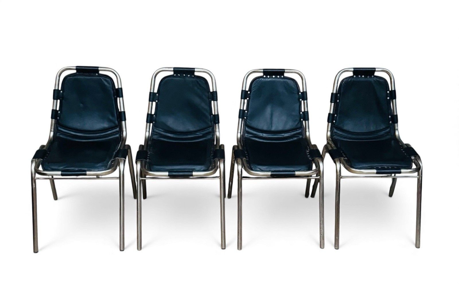 photo buy Set Of Four Les Arcs Steel And Leather Dining Chairs Charlotte Perriand Style