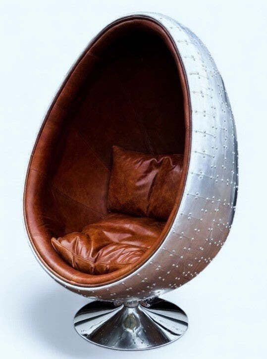 Aviation Swivel Egg Chair With Tan Leather.