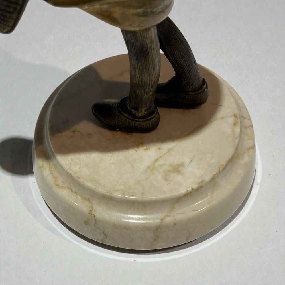 photo furniture An Art Deco Patinated Bronze Figure Of A Young Girl. H. Chiparus