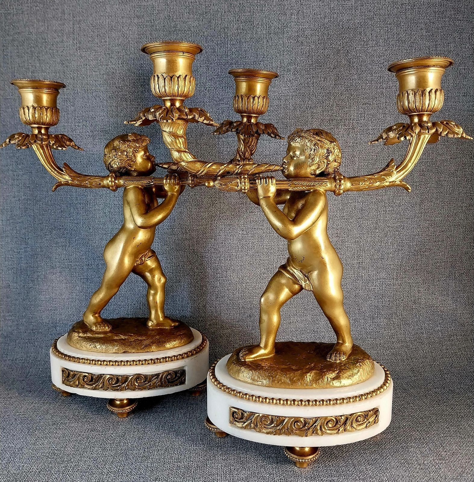 Pair Of Gilt Bronze Cherub Candlesticks