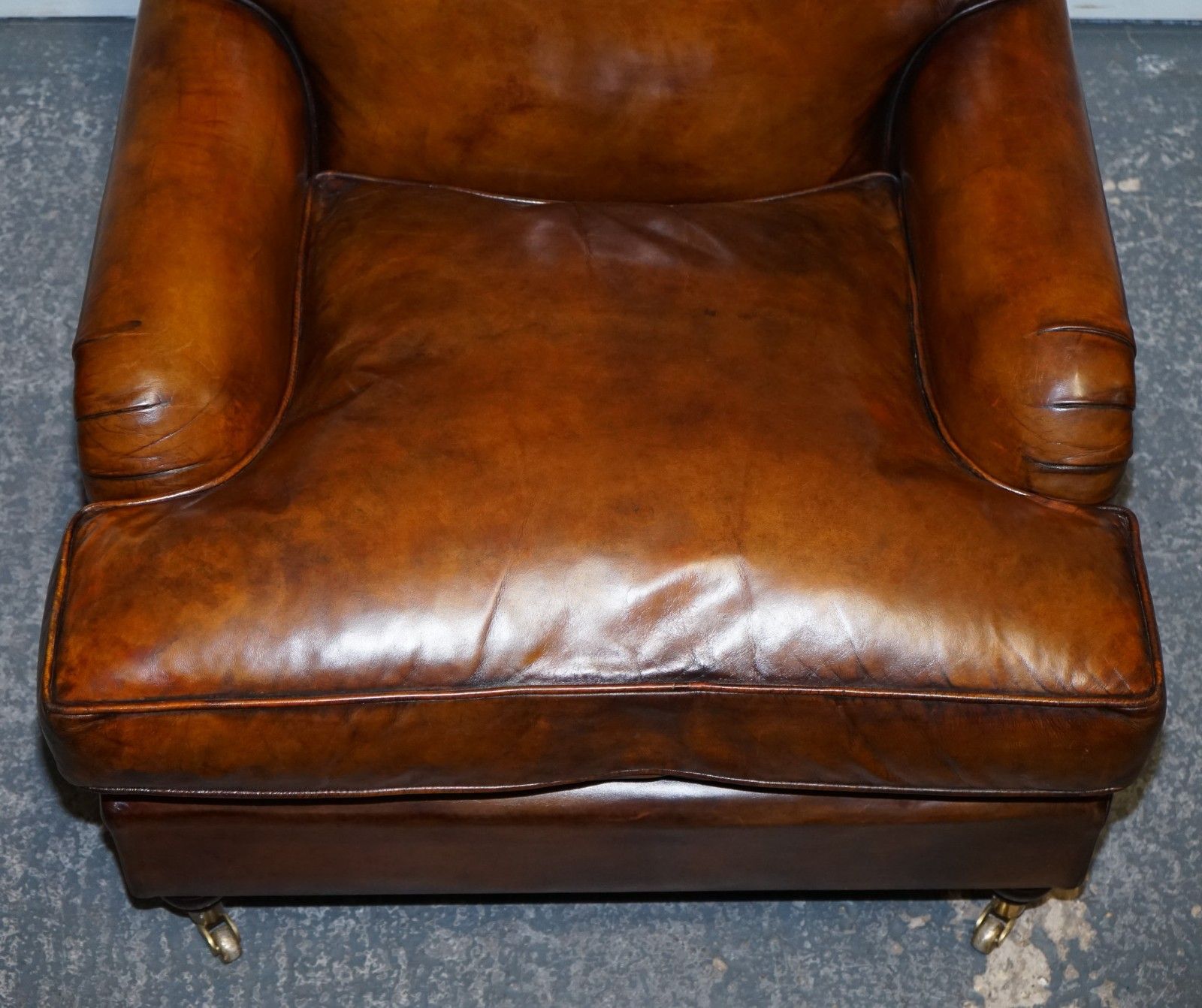 photo vinterior Large Pair Howard Style Hand Dyed Leather Armchairs Feather Filled Cushions