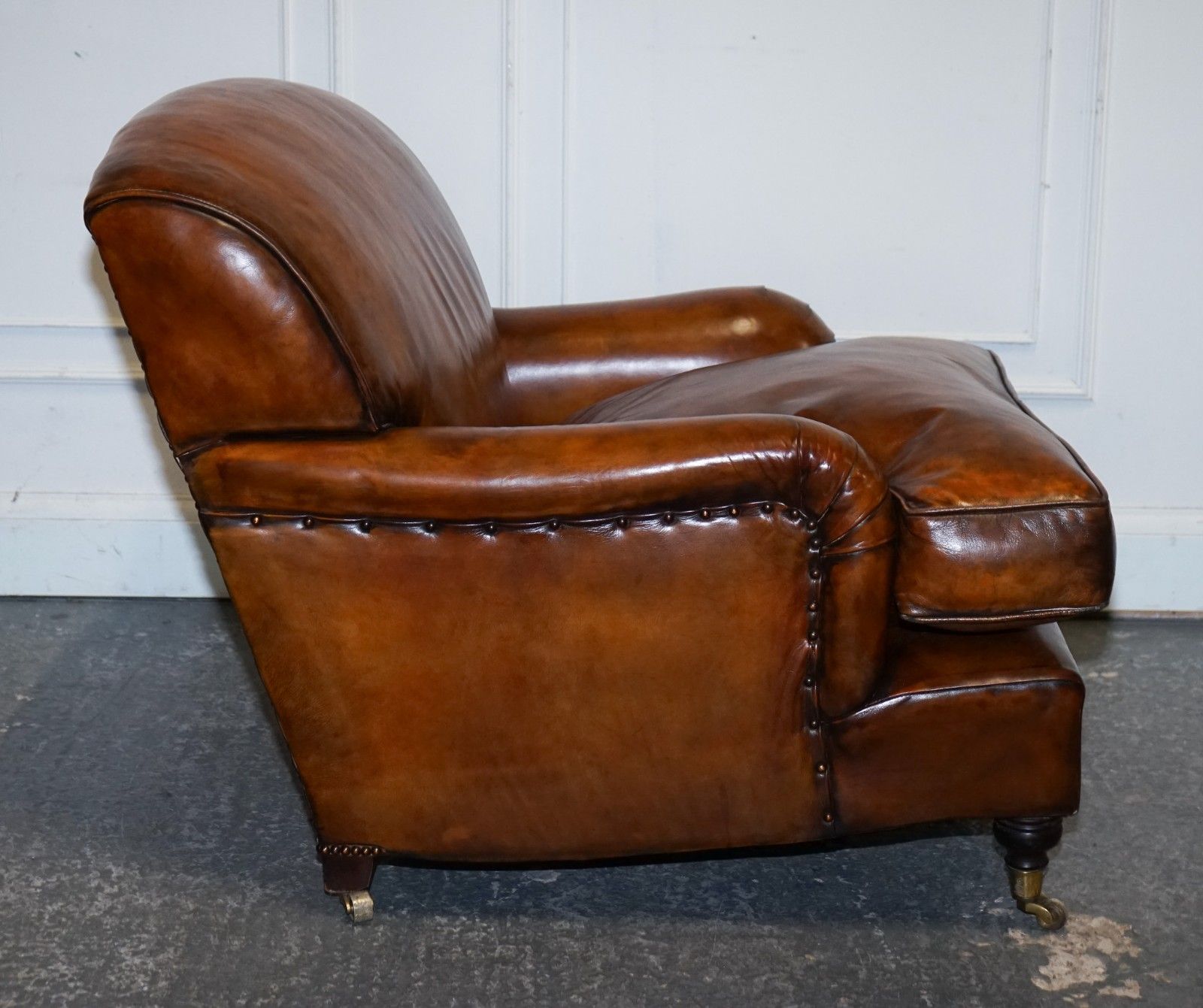 photo buy Large Pair Howard Style Hand Dyed Leather Armchairs Feather Filled Cushions