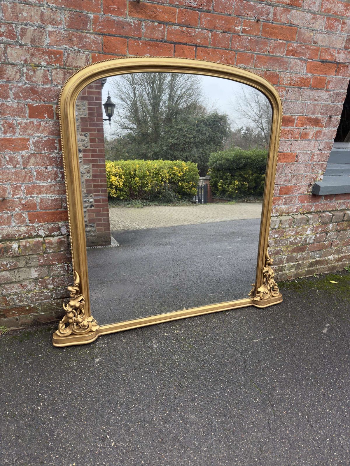 An Exceptional Large Antique English 19th C Arched Top Gilt Overmantle Mirror.