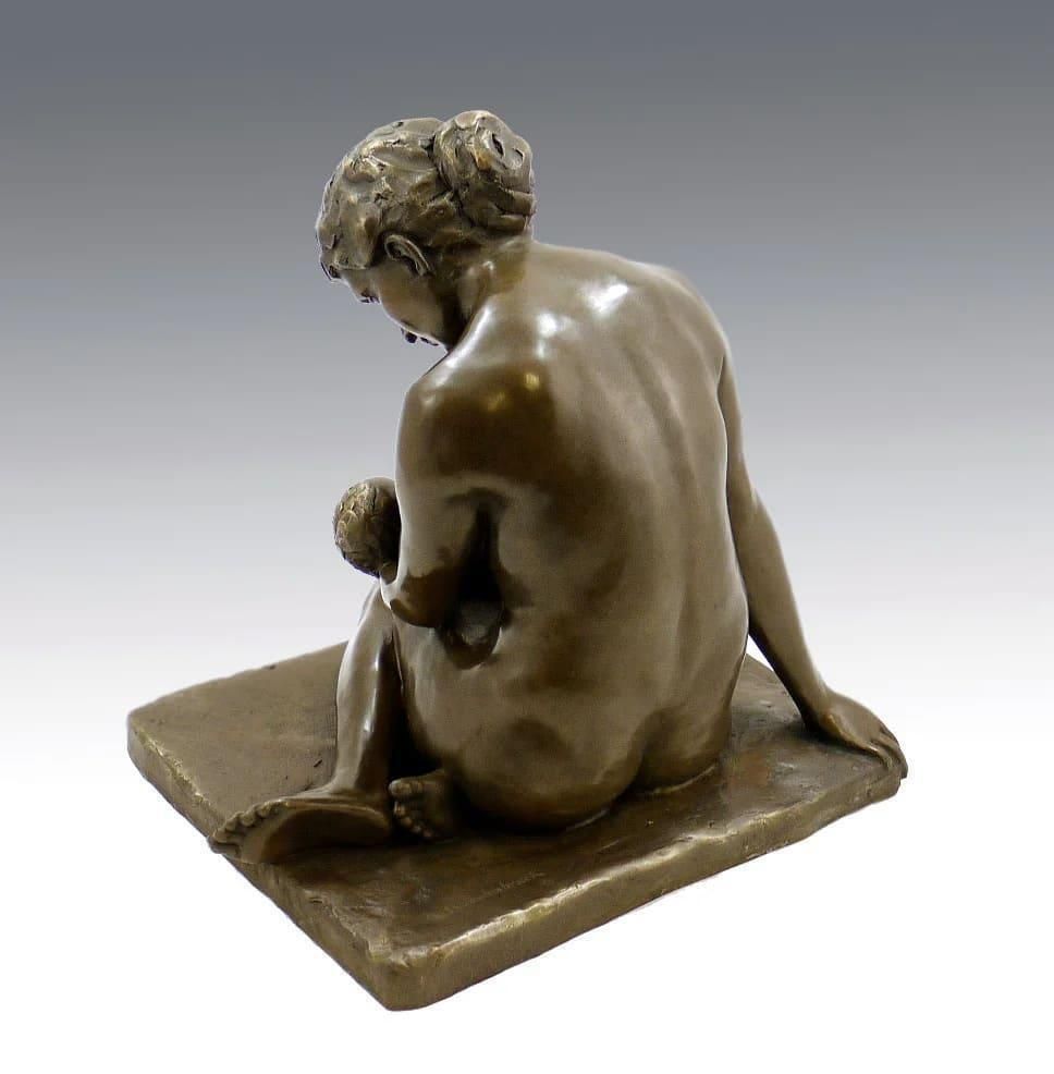 Bronze Sculpture Depicting A Mother And Her Child photo buy