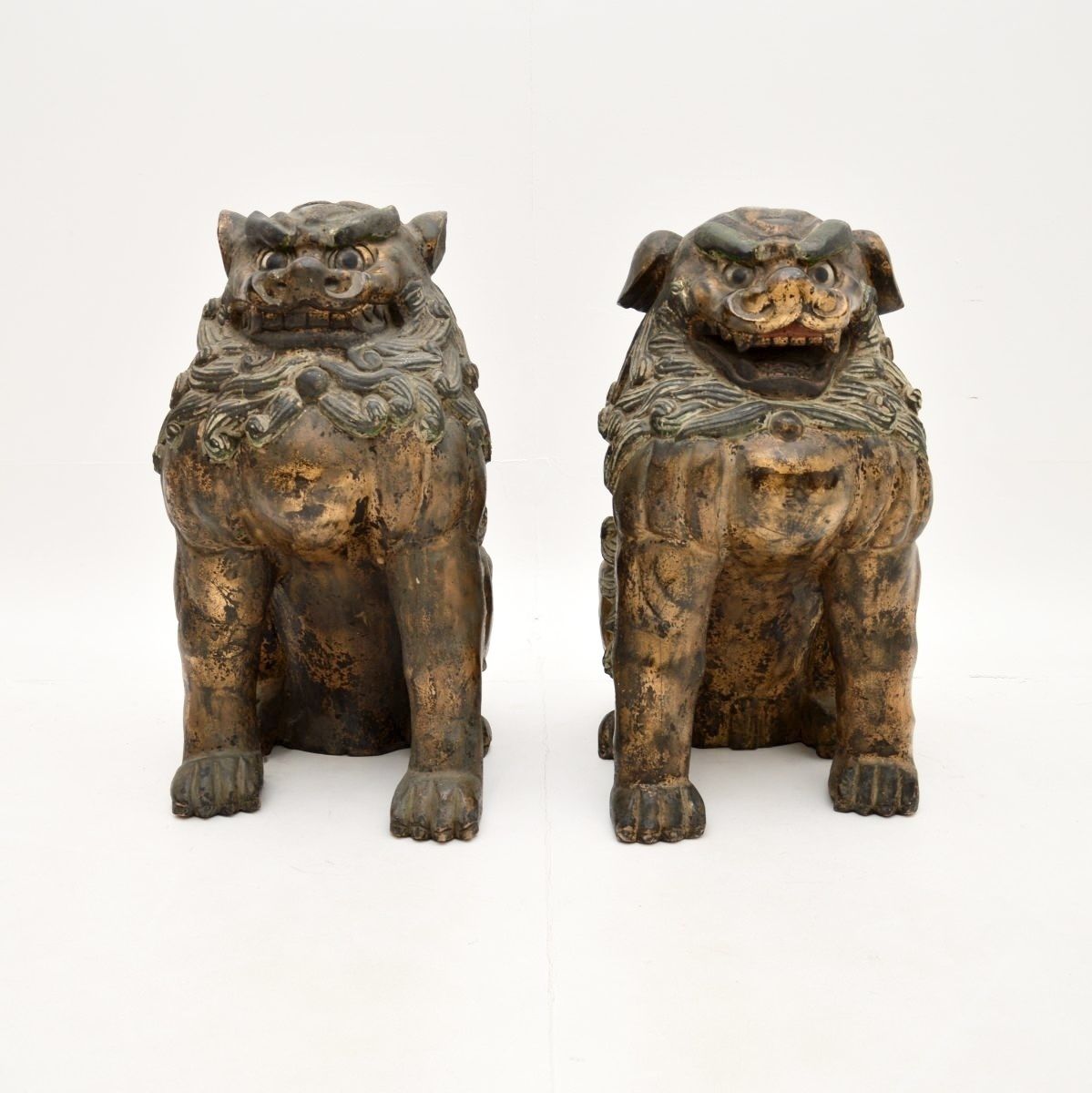Pair Of Antique Chinese Carved Wood Foo Dog Statues photo for sale