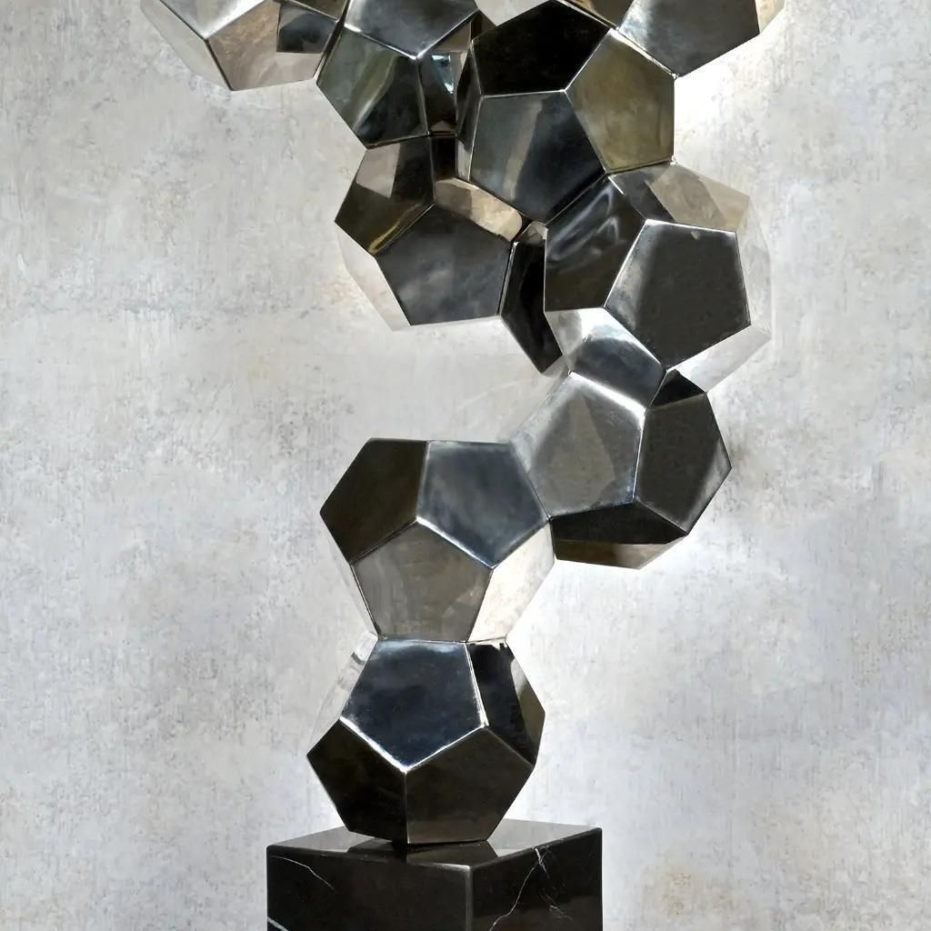 Contemporary Sculpture In Chromed Metal On A Black Marble Base photo Art