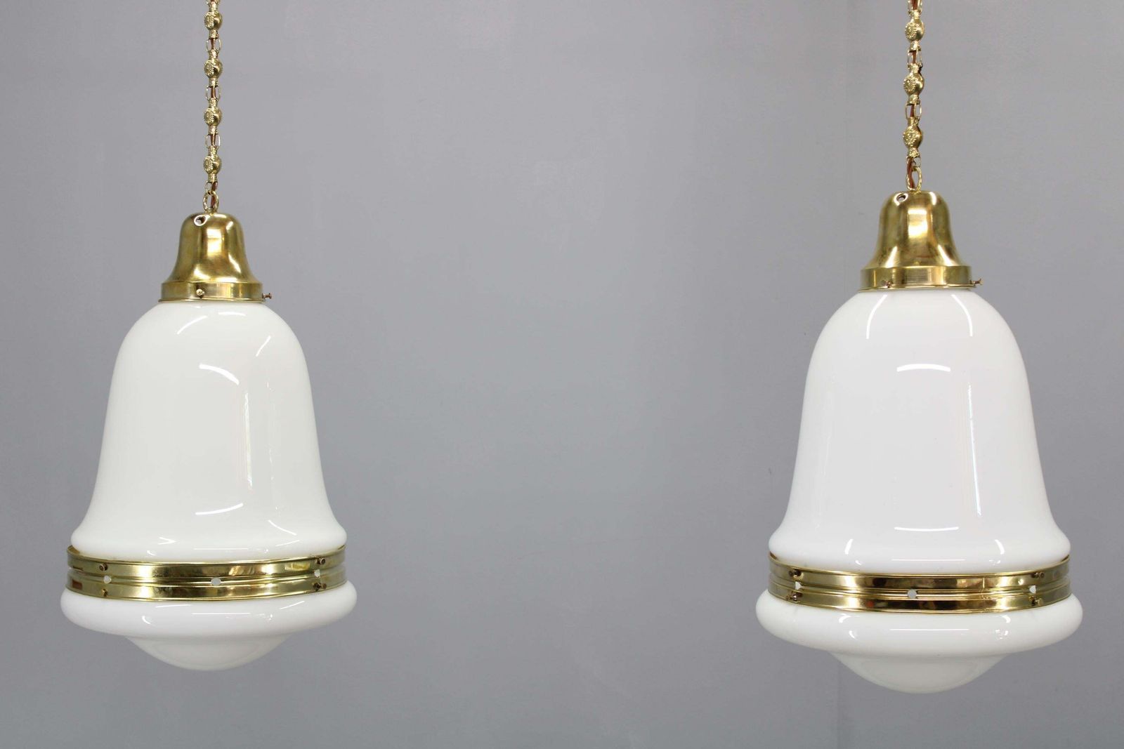 Pair Of 1930s Peter Behrens Luzette Pendants In Opaline Glass And Brass photo for sale