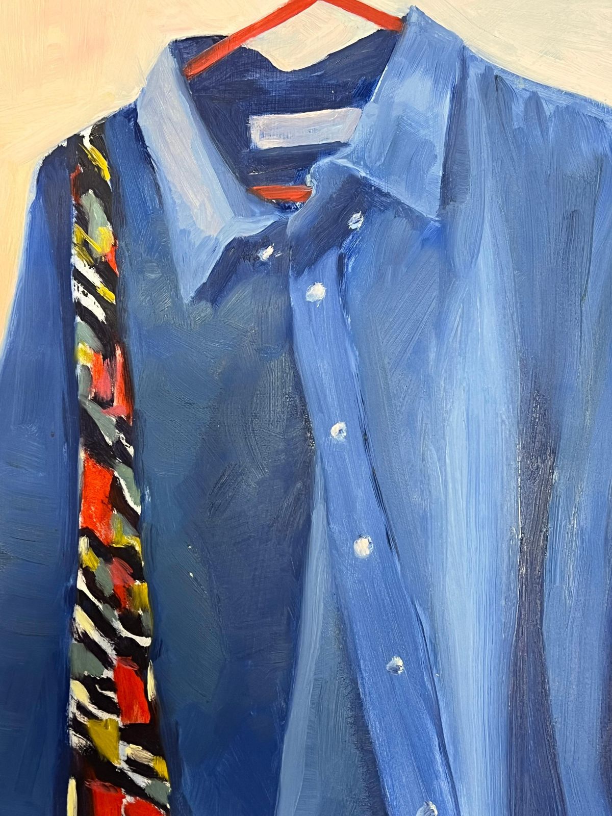 Jill Jacksonblue Denim Shirt Hanging On A Red Hanger With A Boldly Patterned Scarf photo Art