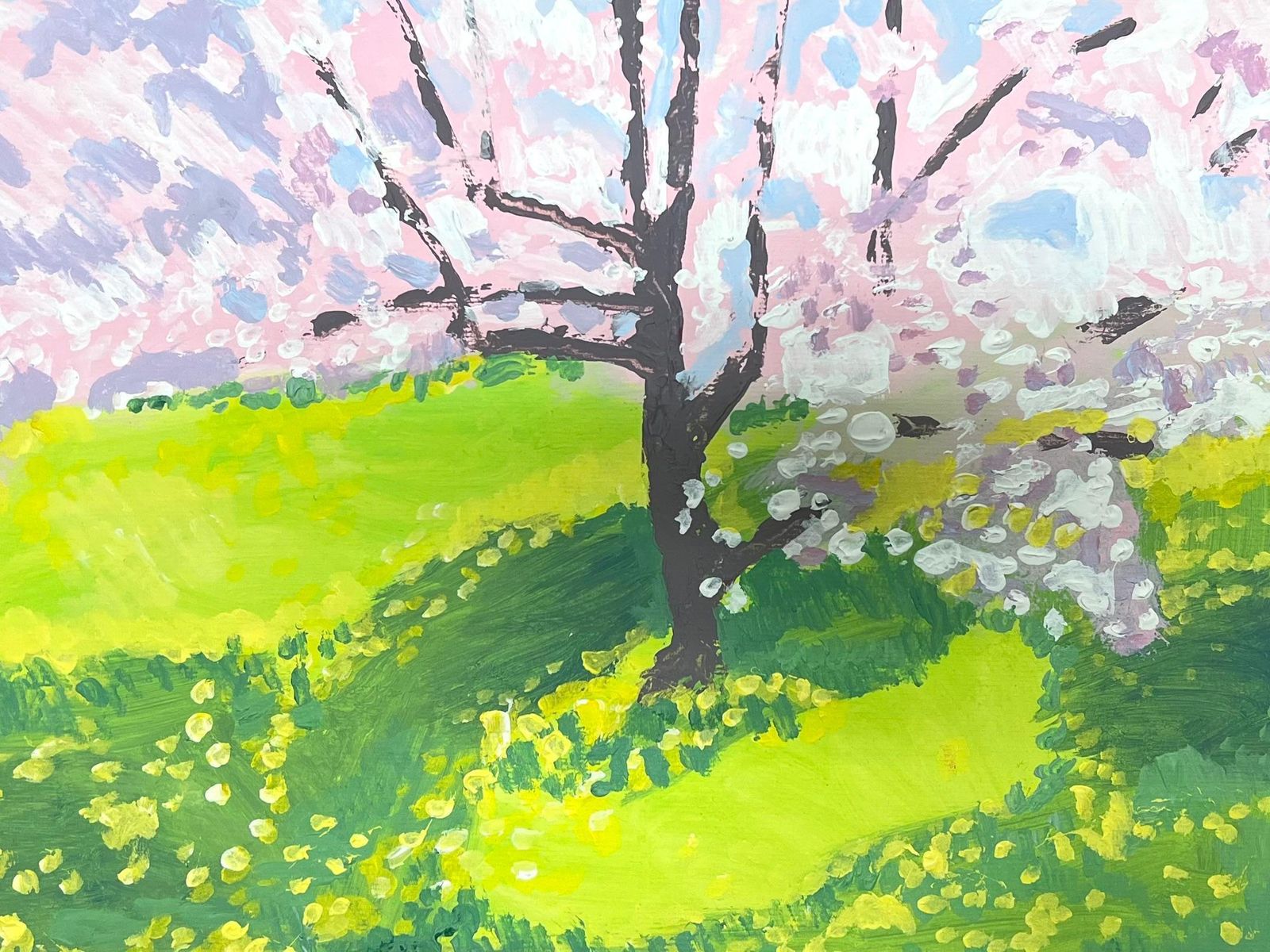 Helen Greenfielda Blooming Cherry Blossom Tree Casts Its Petals Over A Sun Kissed Green Meadow
