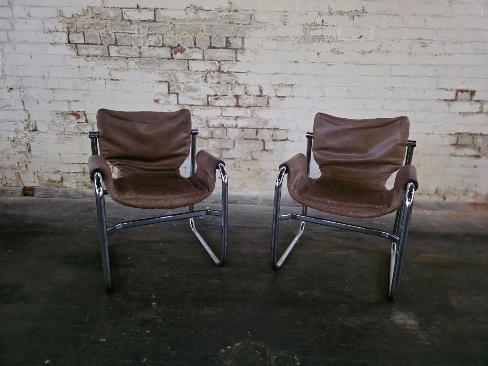 A Pair Of Mid Century Sling Chairs By Maurice Burke Circa 1960s