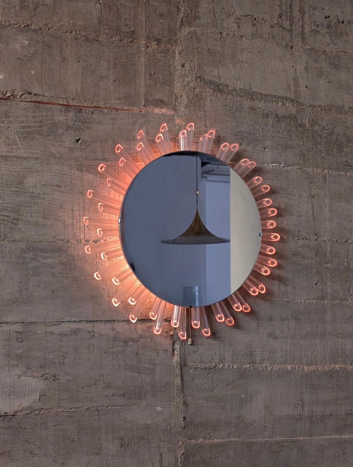 photo for sale Mid Century Modern Sun Mirror Wall Mirror In Lucite With Pink Light, 1970s