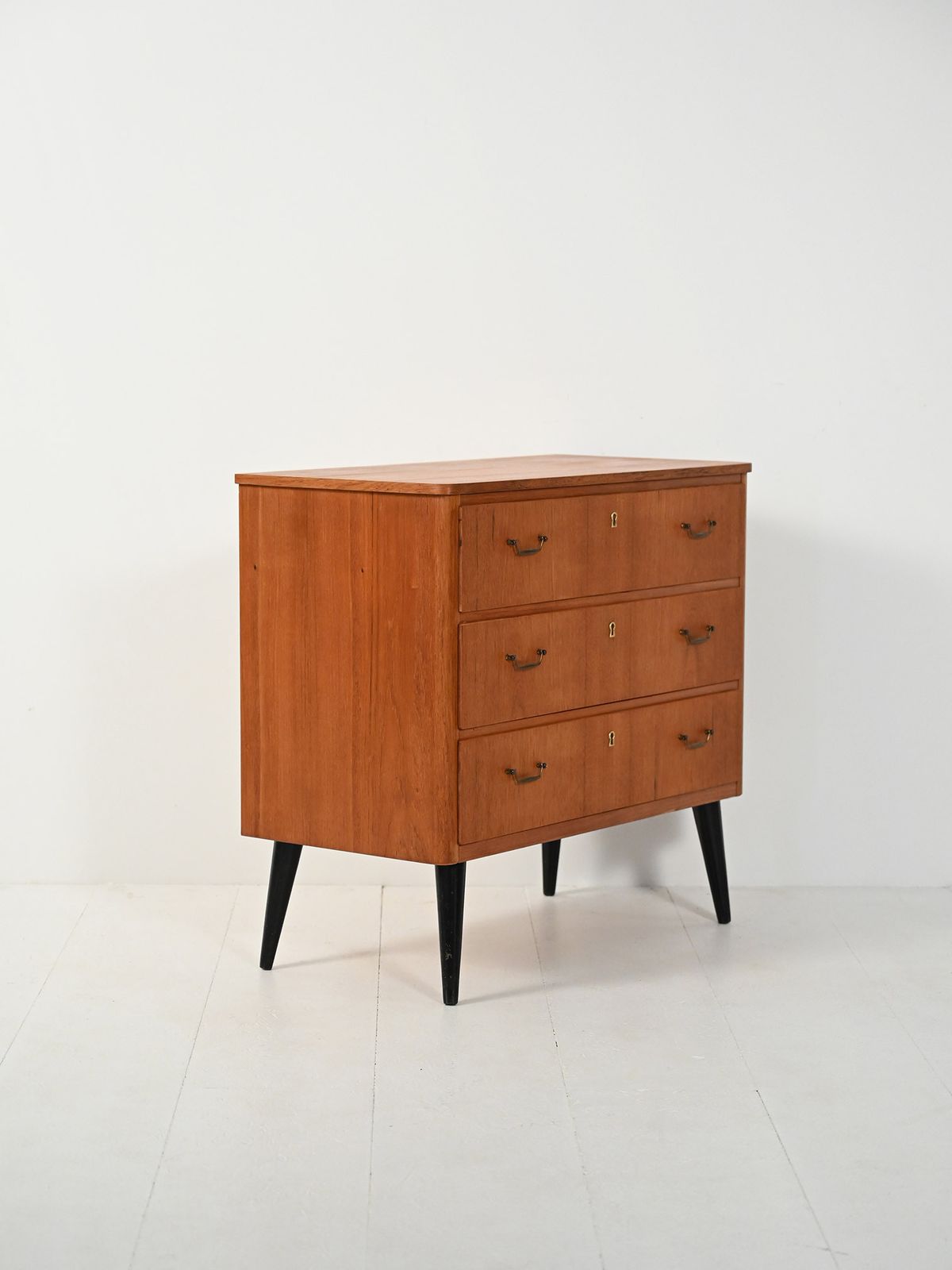 Scandinavian Teak Chest Of Drawers With Black Legs photo for sale