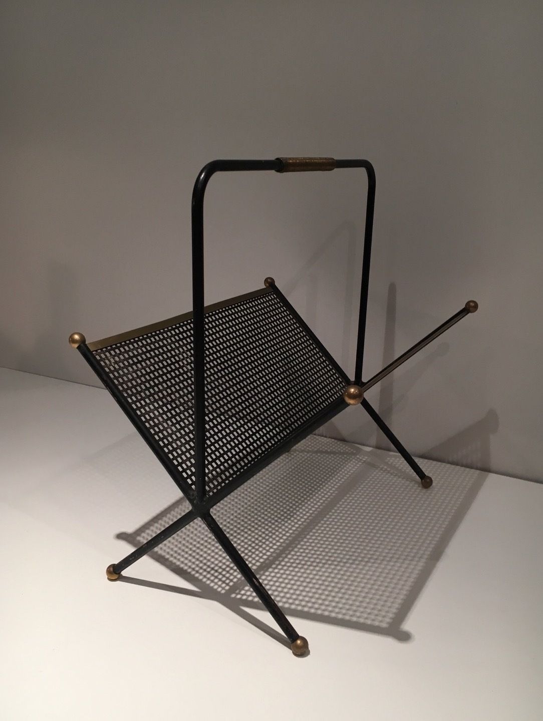 Design Magazine Rack In Black Lacquered Metal, Perforated Sheet Metal And Brass photo 580.0