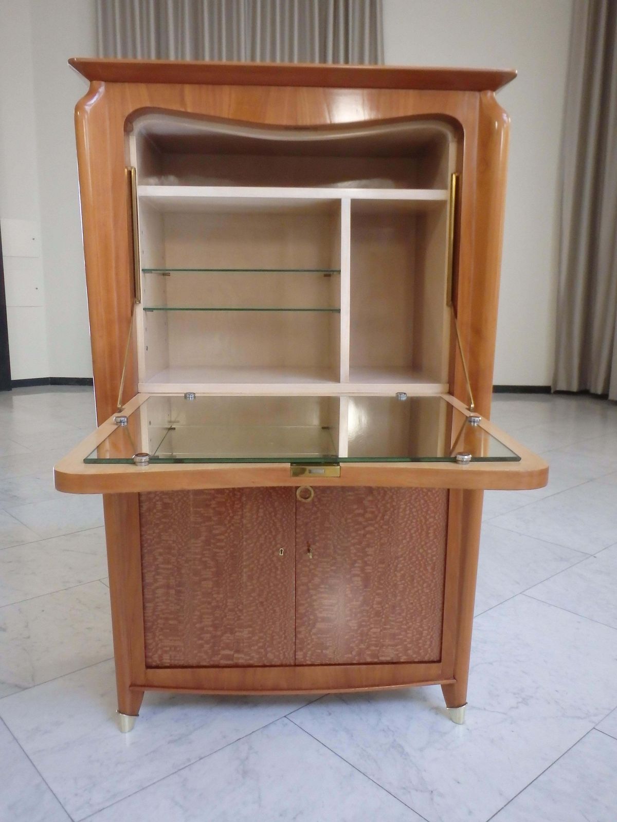 4282.0 1940this Art Deco Dry Bar Birch With On The Doors Brass Decor On The Legs photo