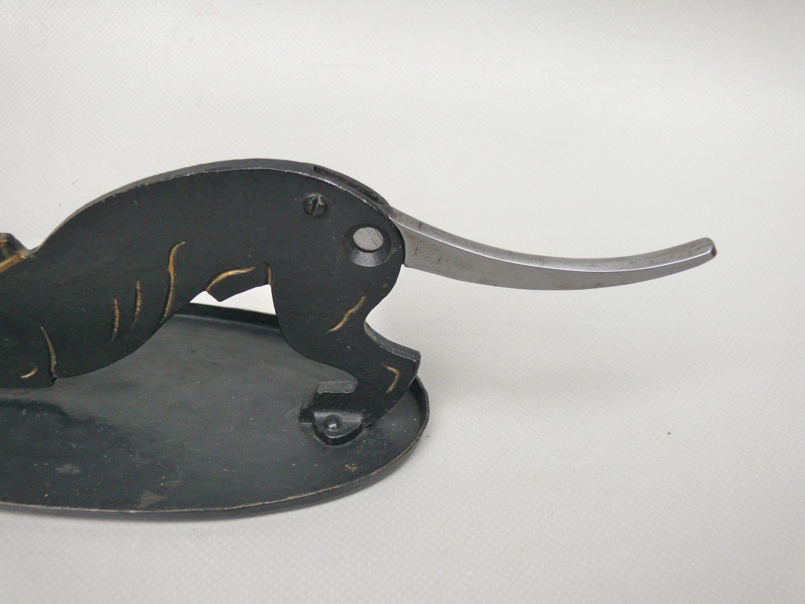 photo vintage Arts And Crafts Art Nouveau Iron, Brass, Black And Gold Cigar Cutter, 1890s
