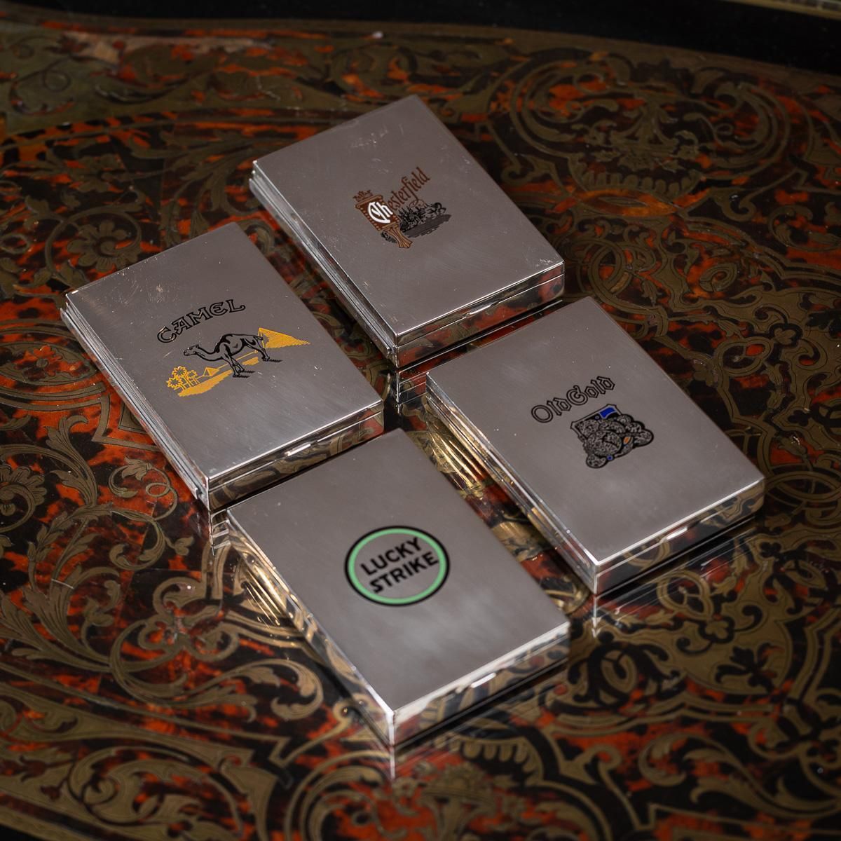 Set Of Four American Solid Silver & Enamel Cigarette Boxes By Cartier photo furniture