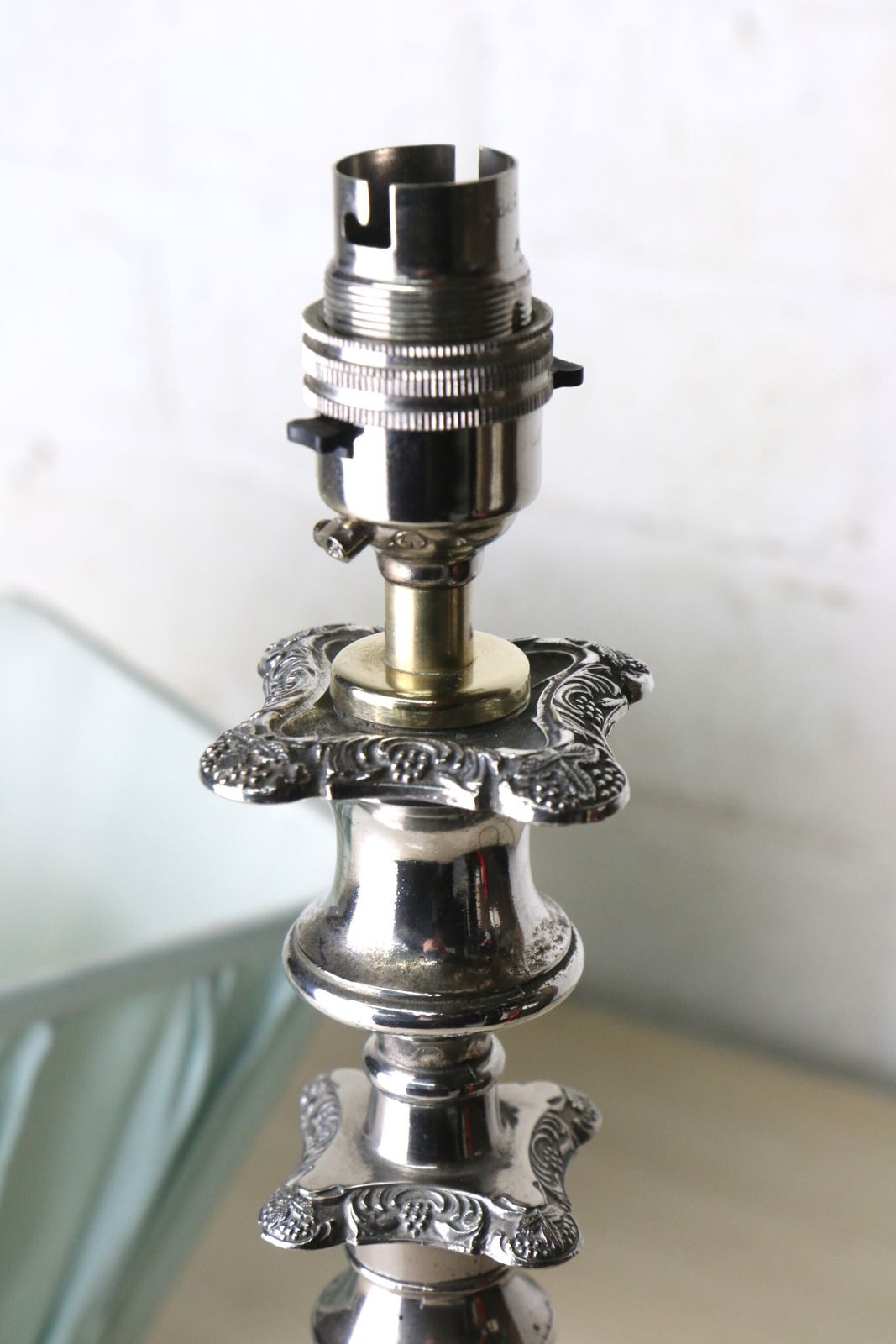 photo furniture A Vintage Silver Plated Table Lamp With Ornate Castings With A Pale Sage Pinch Pleated Lampshade