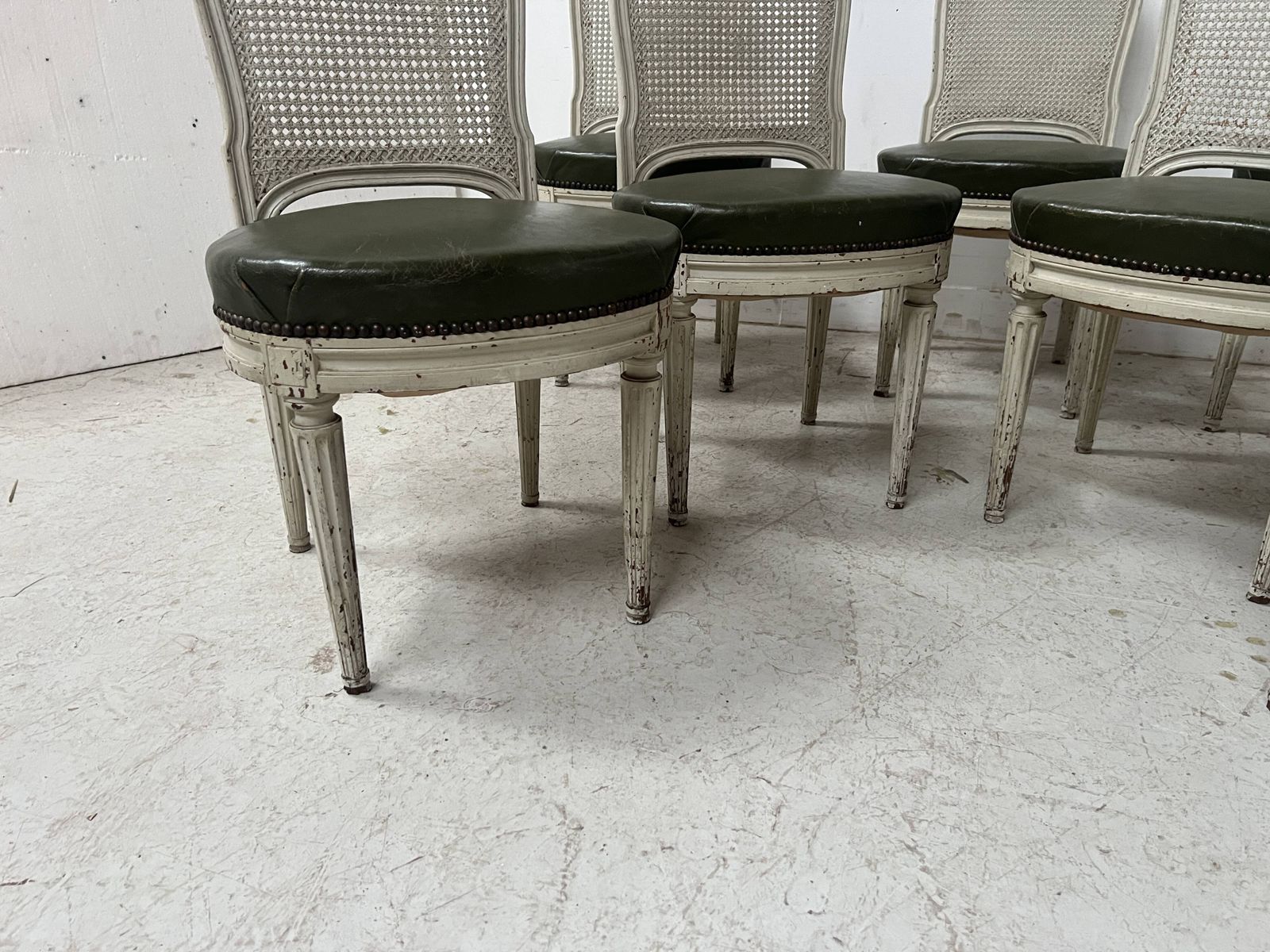 Set Of Seven Louis XVI Style Chairs In Patinated Beech, 20th Century. photo for sale