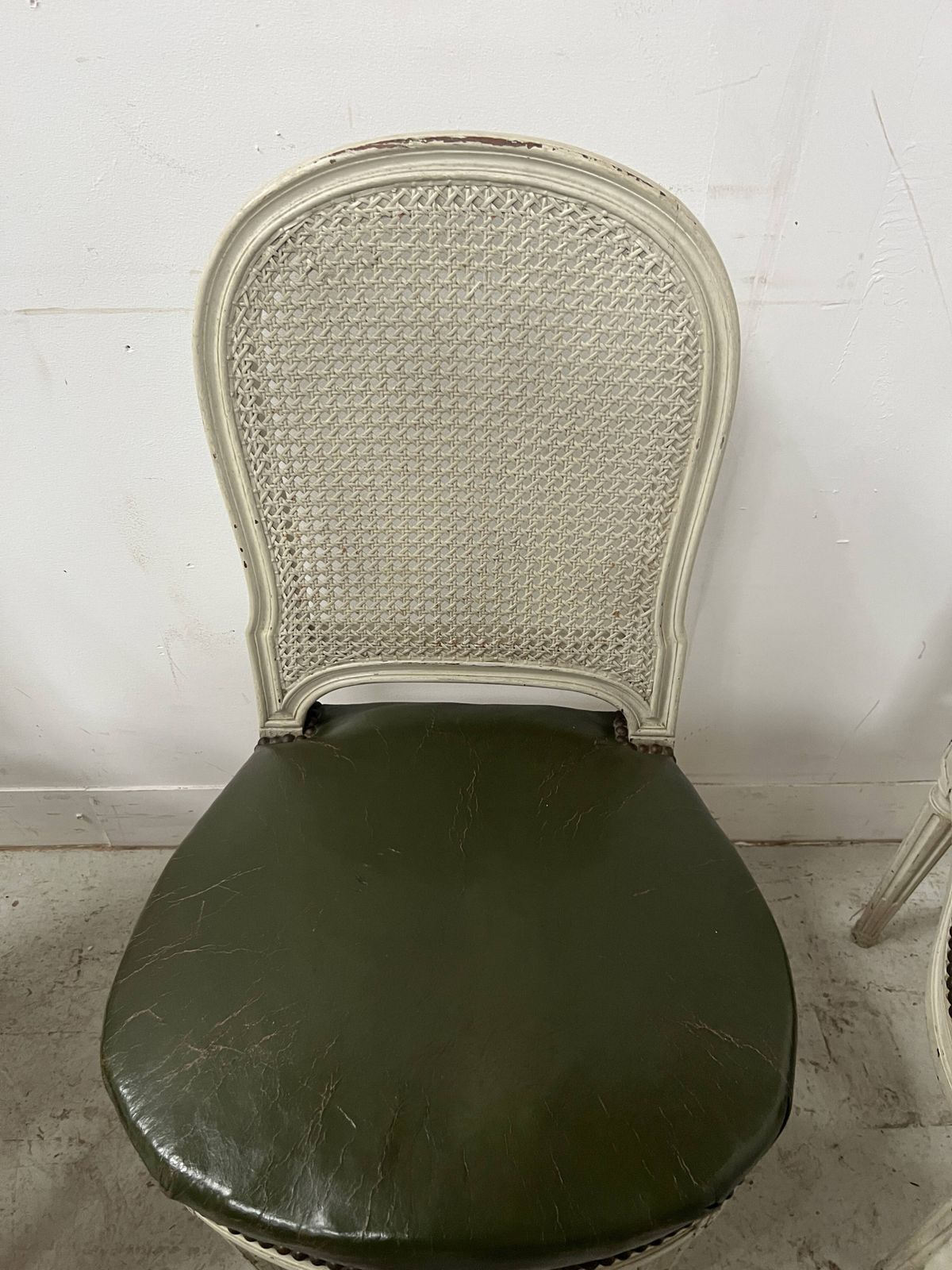 photo vintage Set Of Seven Louis XVI Style Chairs In Patinated Beech, 20th Century.