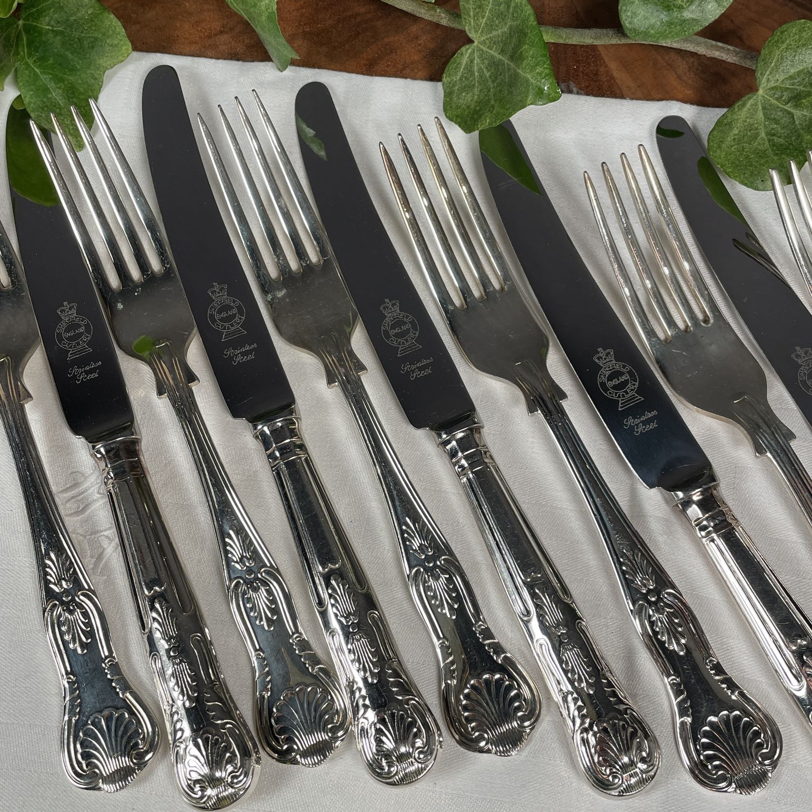 A Set Of Silver Plated Knives And Forks photo Home Decor