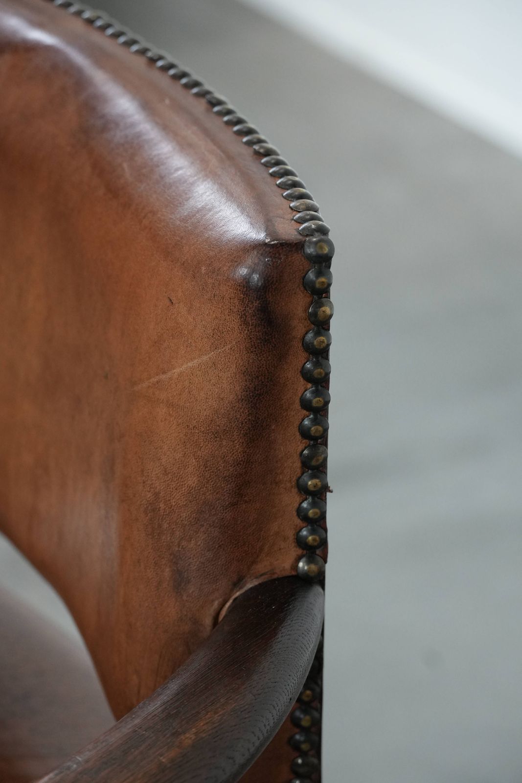 photo vinterior Beautiful Elegant Antique Sheepskin Desk Chair With A Heavy Wooden Frame