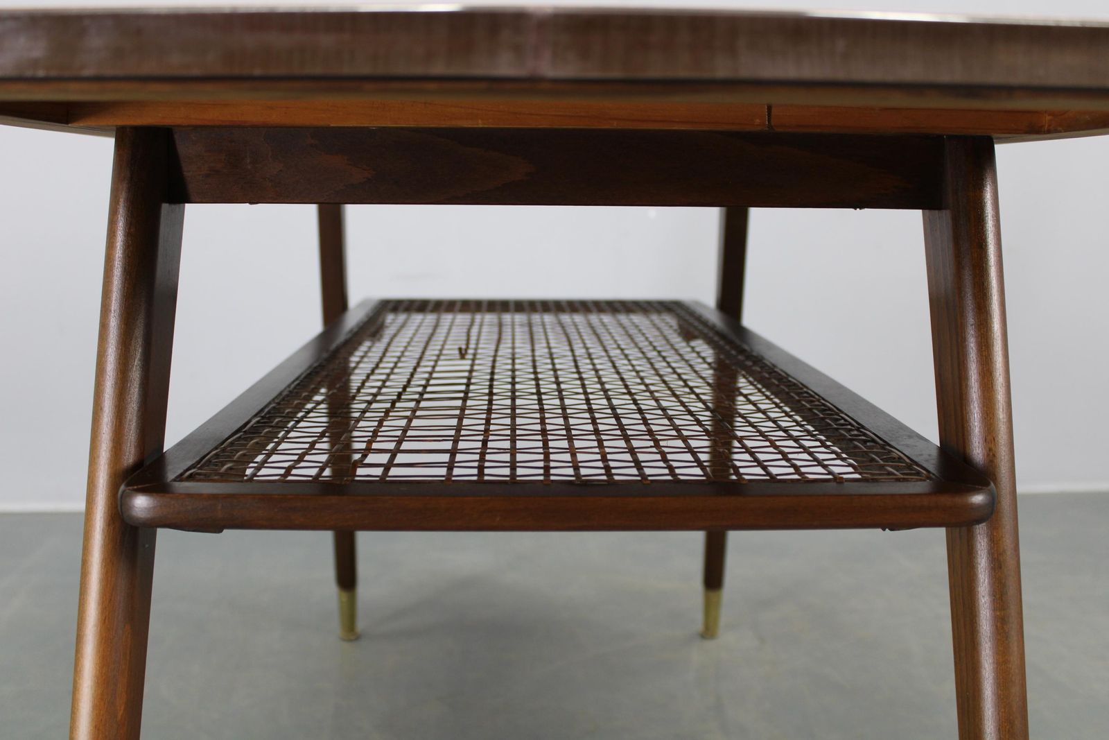 photo furniture Mid Century German Coffee Table With Rattan Shelf And Brass Legs