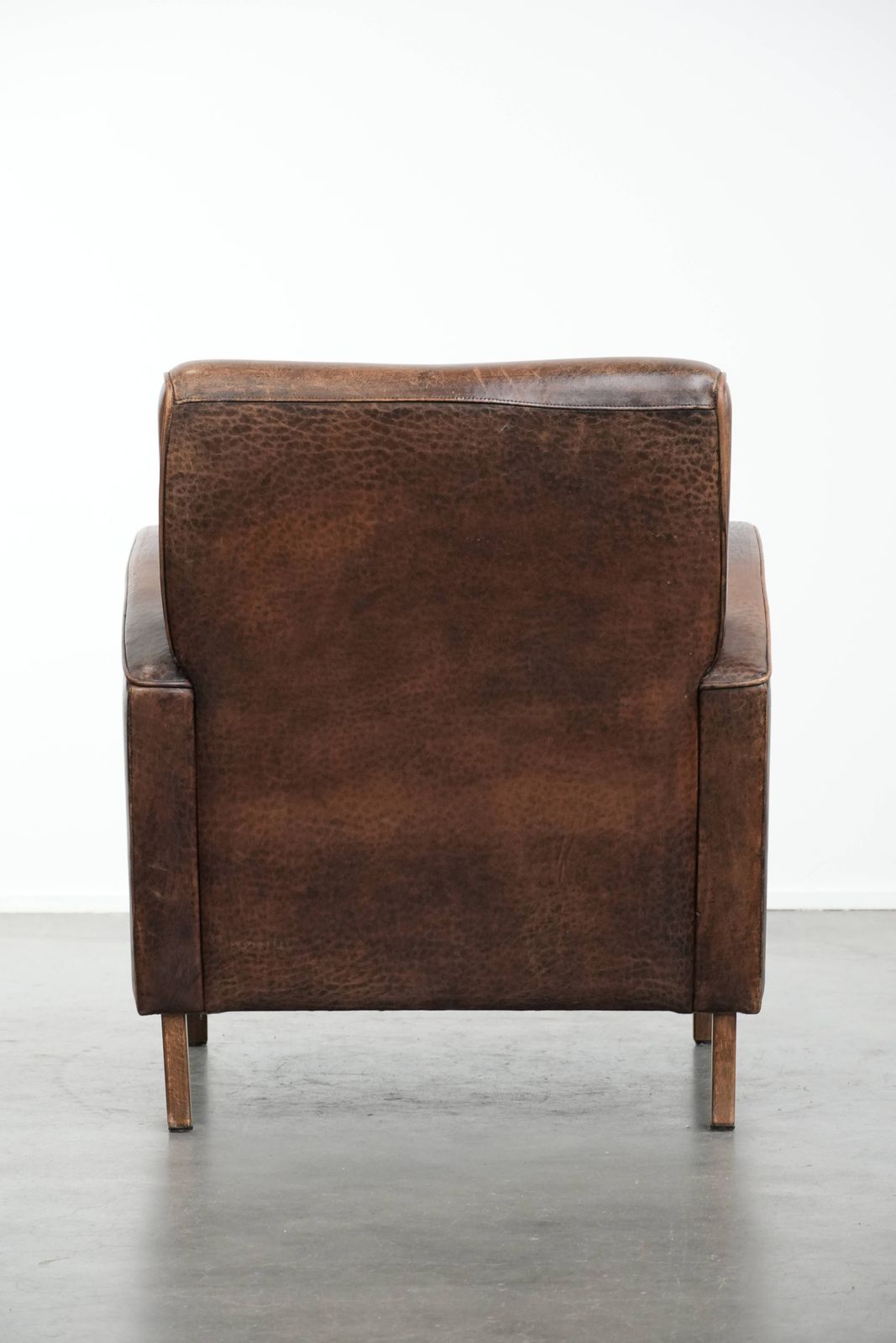 Sturdy And Timeless Vintage Sheepskin Armchair With A Round Design And Comfortable Seat photo Furniture