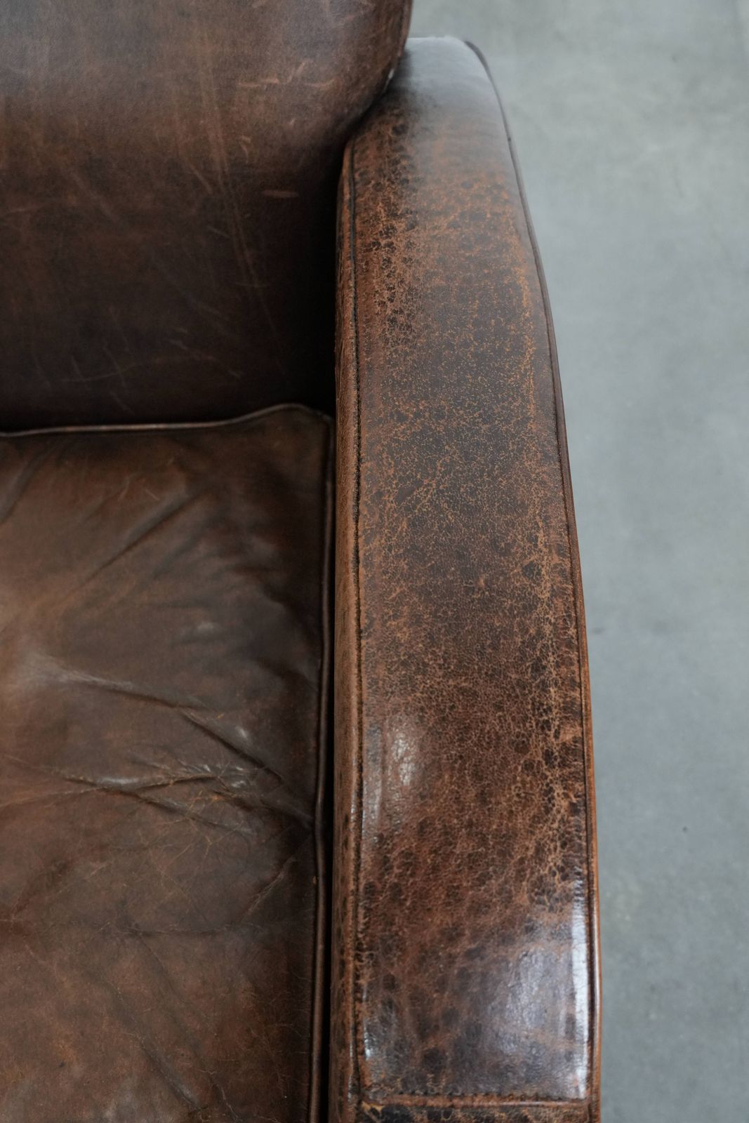 Sturdy And Timeless Vintage Sheepskin Armchair With A Round Design And Comfortable Seat photo vintage