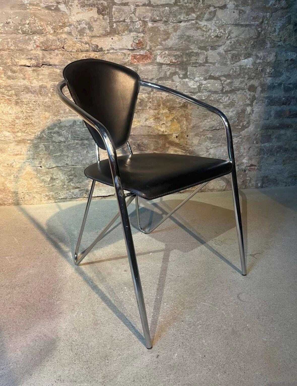 Effezeta Chairs With Black Leather Upholstery And A Chrome / Tubular Steel Frame photo furniture