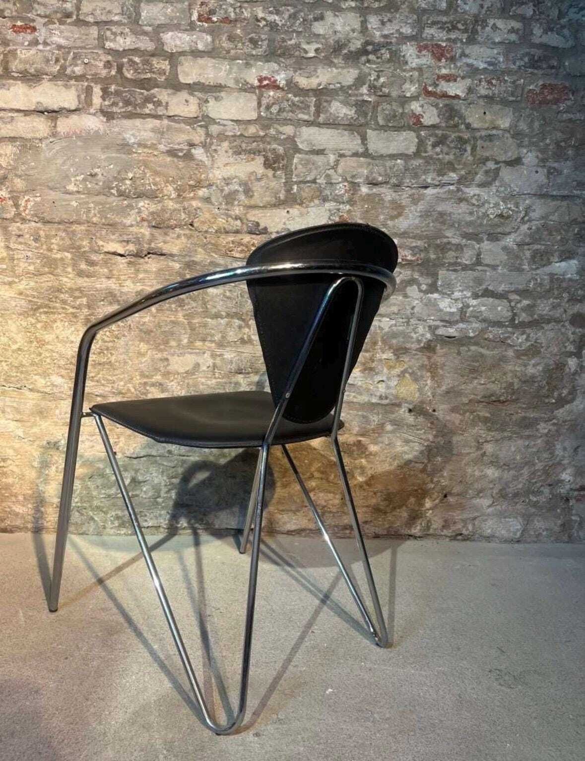 Effezeta Chairs With Black Leather Upholstery And A Chrome / Tubular Steel Frame photo 1523.0