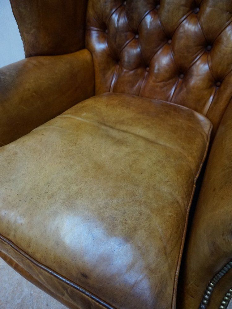 Mid Century Cognac Leather Chesterfield Wingback Armchair, 1960s photo vinterior