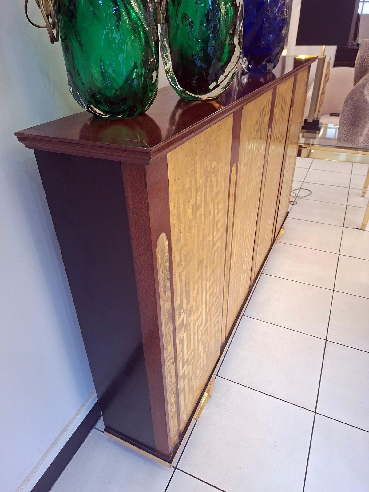 photo vintage Console Furniture After Eugene Printz With 4 Doors Gold Leaves Lacquered