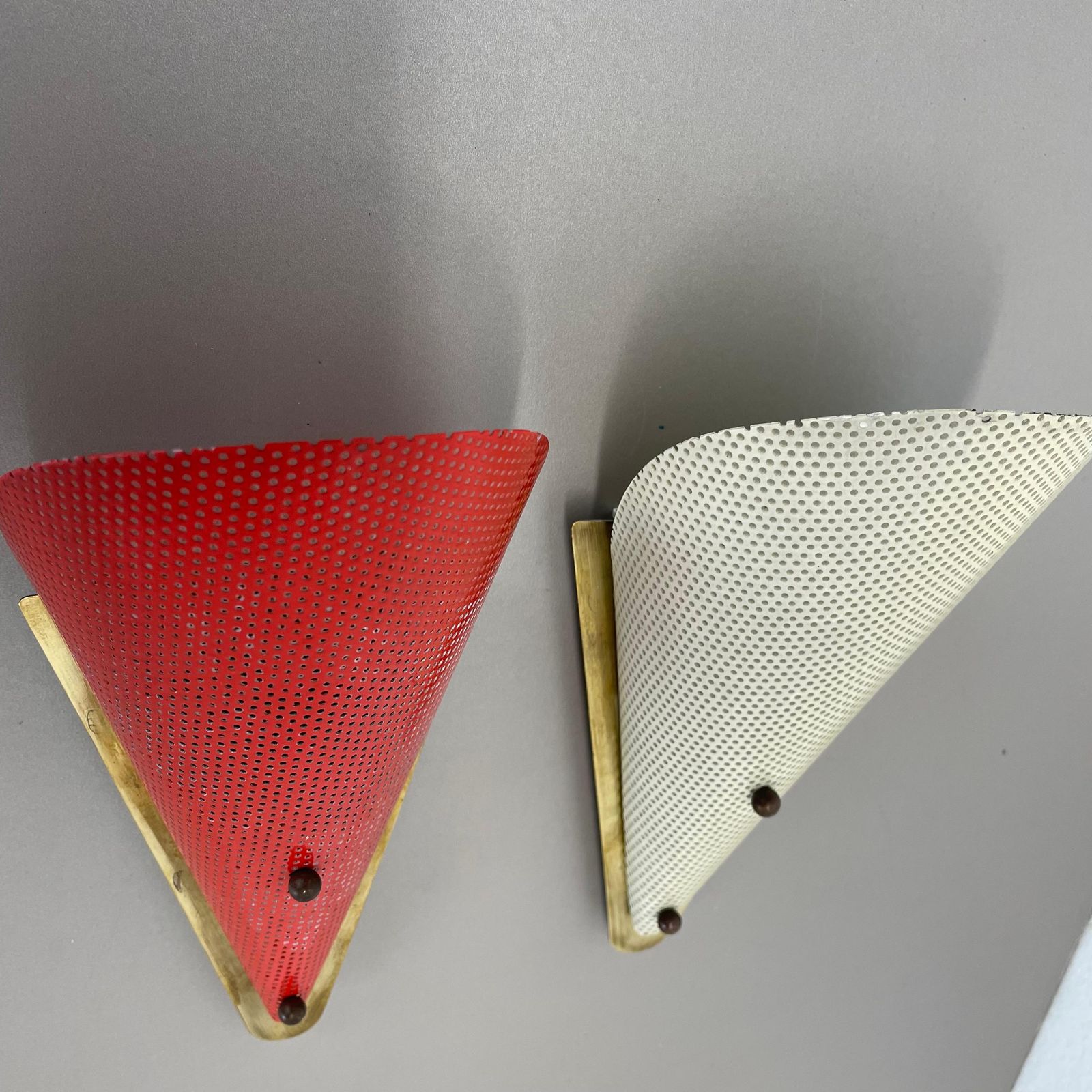 photo for sale Set Of Two Hole Pattern Theatre Wall Light Sconces Mategot Style, France, 1950