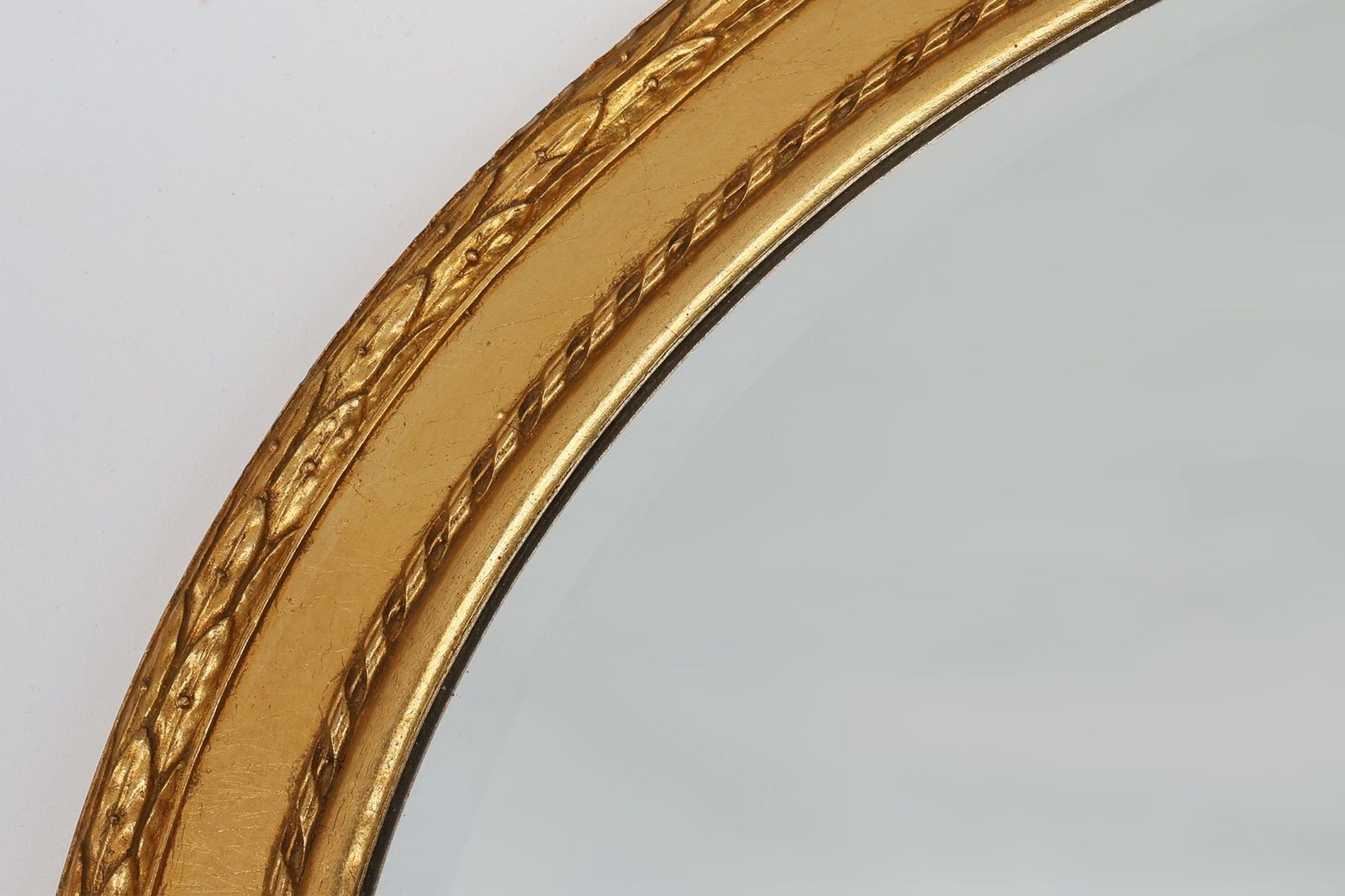 photo furniture Oval Shaped Carved Gilded Baroque Mirror With Beveled Glass, 1960s