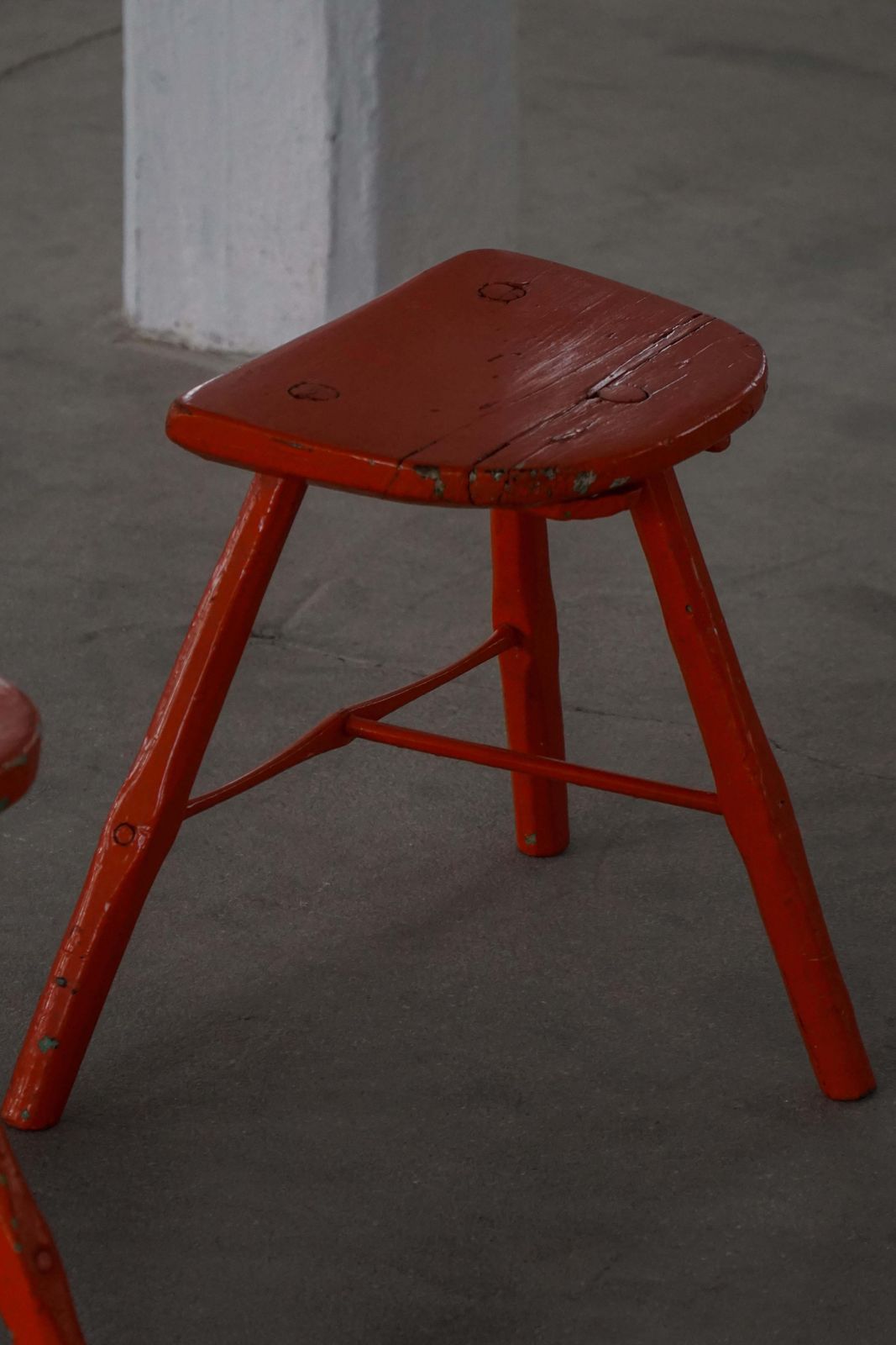 671.0 Pair Of Patinated Red Painted Wooden Stools With Splayed Legs, 1950s–1960s photo