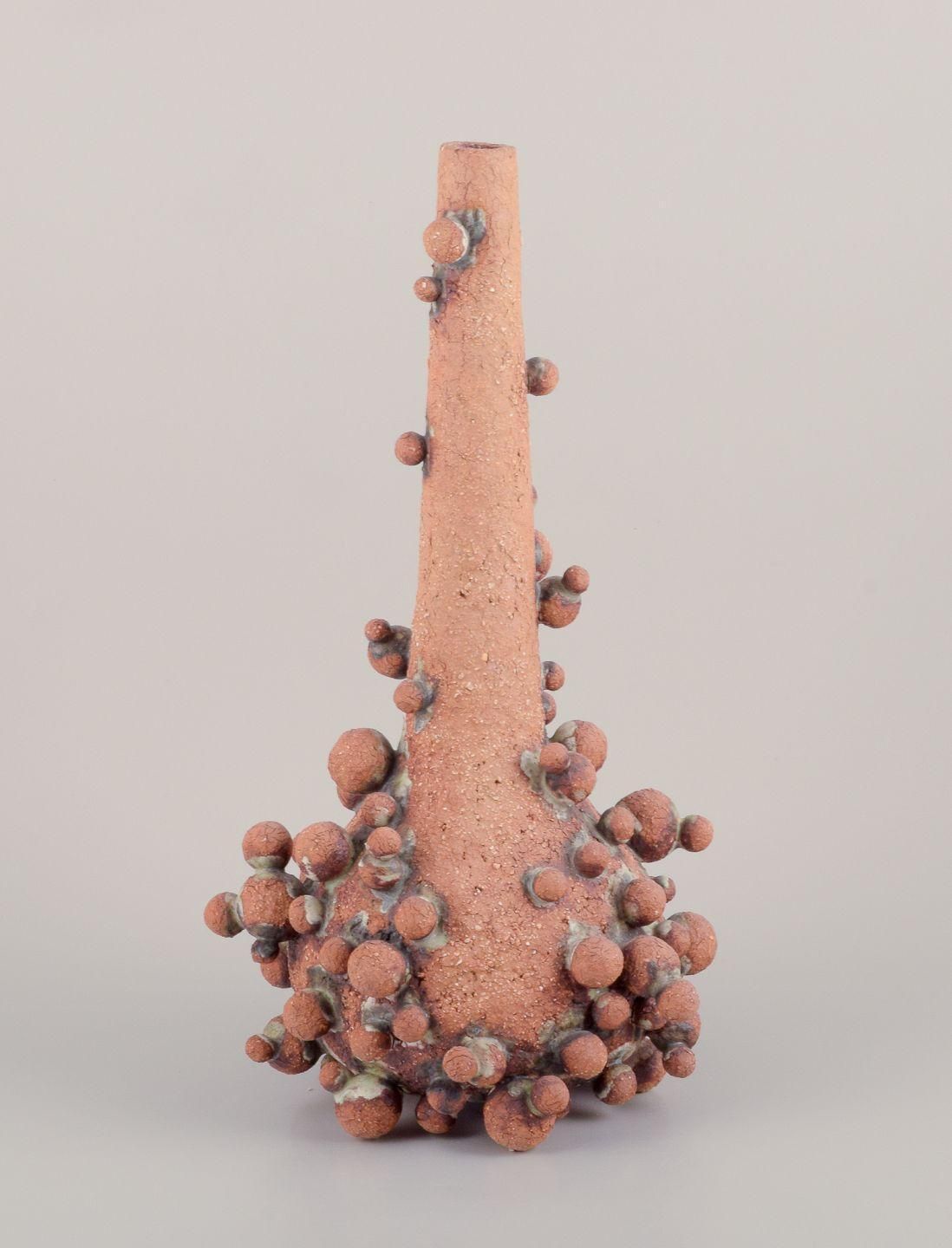Christina Muff, Contemporary Danish Artist. Tall Vessel Covered In Clay Balls. photo furniture