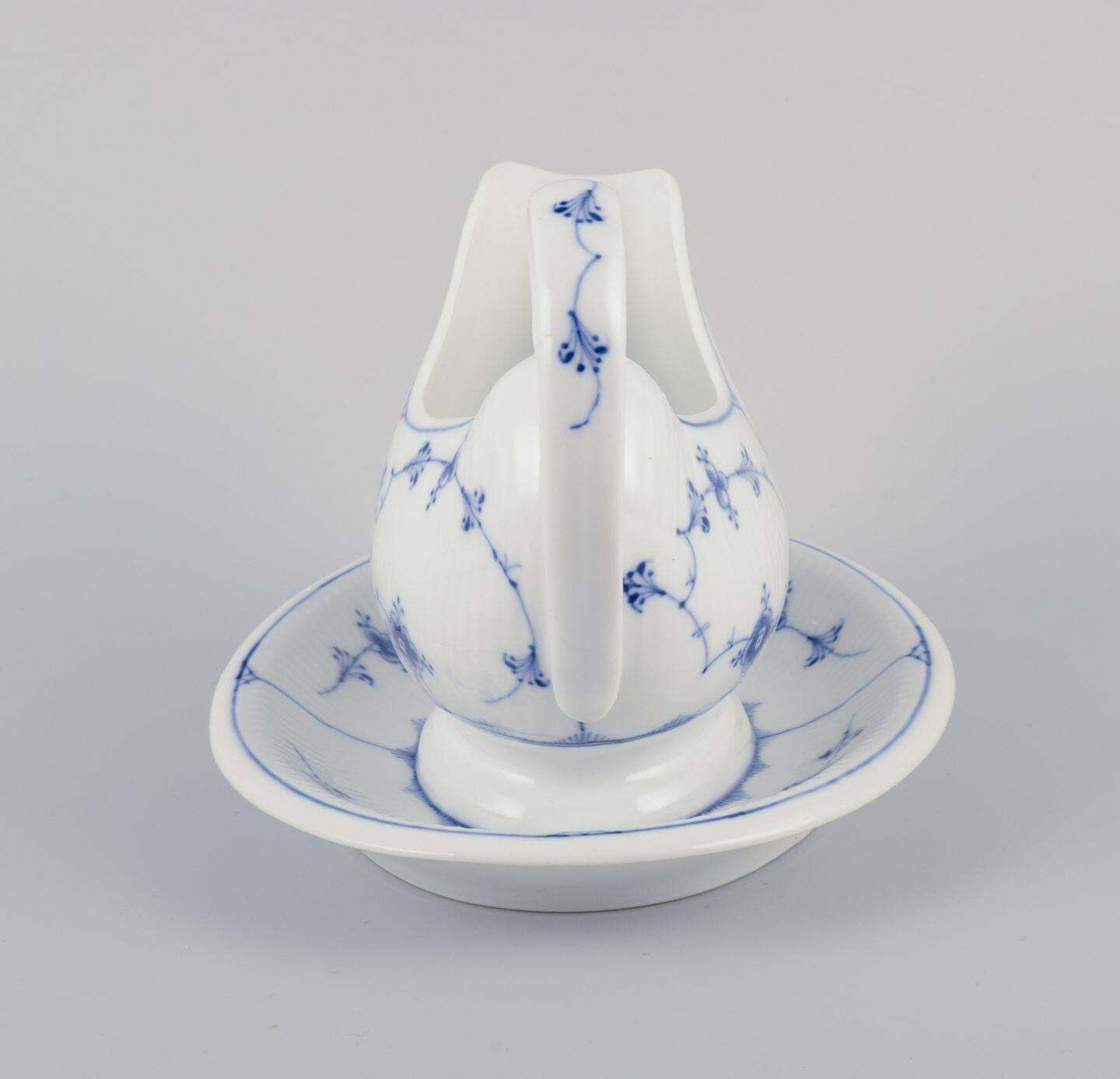 Royal Copenhagen Blue Fluted Plain. Antique Gravy Boat In Porcelain. photo for sale