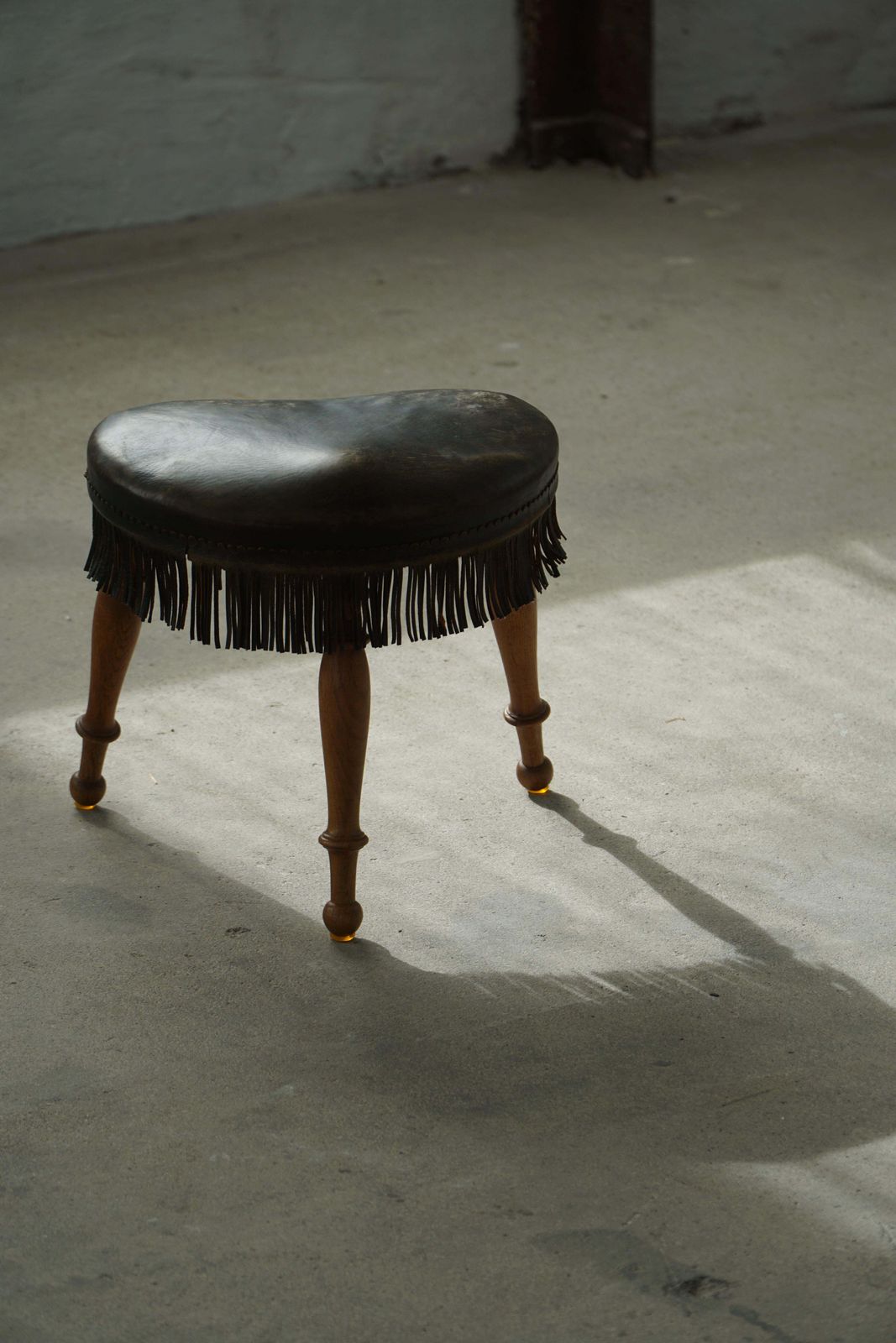 537.0 Early 20th Century, Danish Tripod Oak Stool With Leather Fringe, 1930s photo