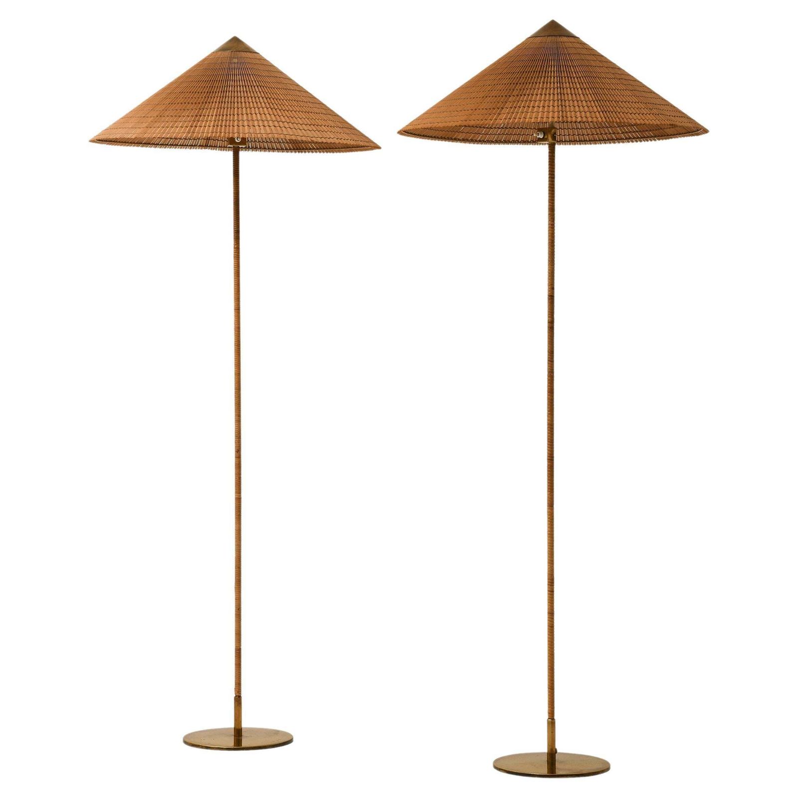 Pair Of Floor Lamps In Brass, Cane And Cane Shades By Paavo Tynell, 1950's