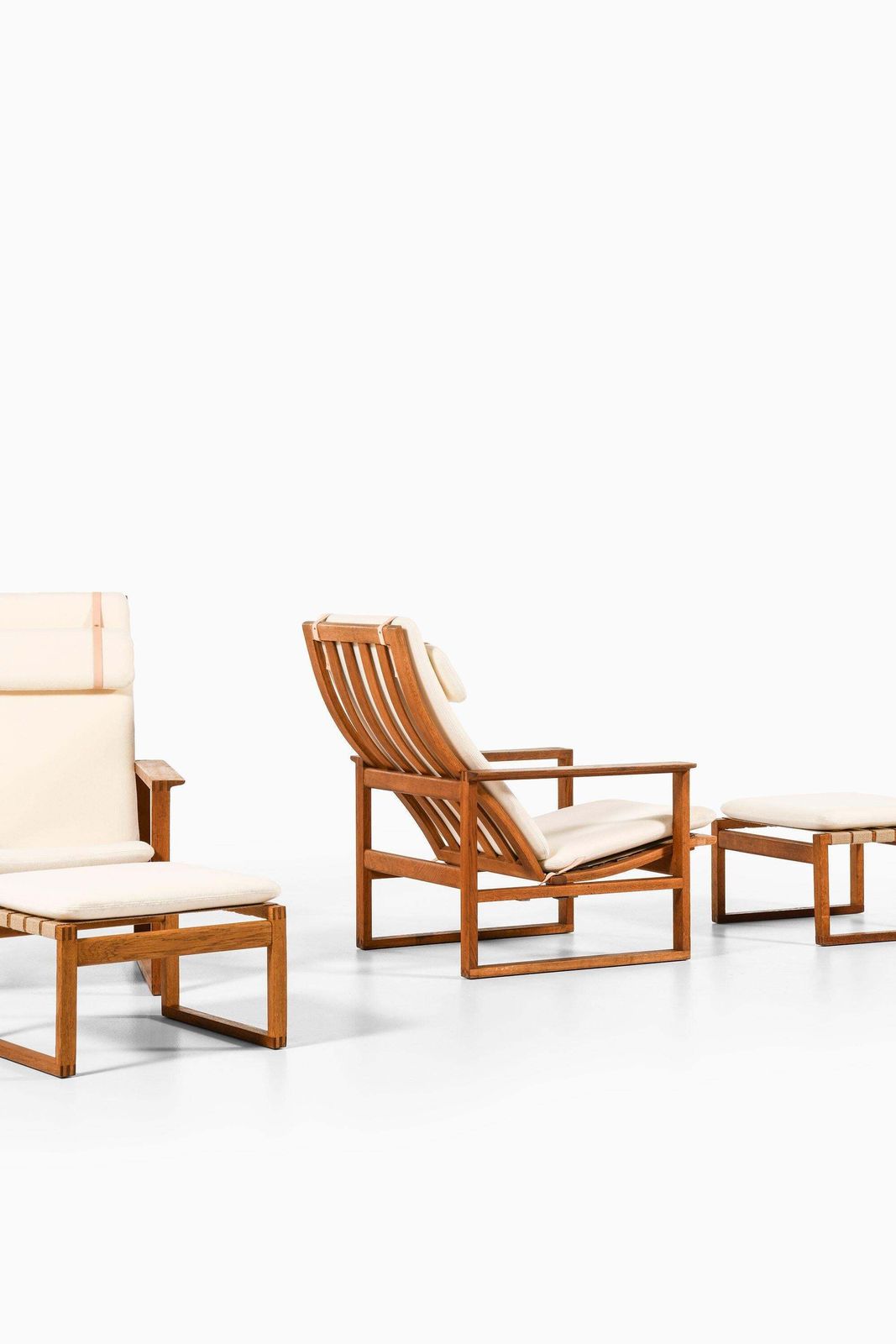 Pair Of Easy Chairs With Stools In Oak And Brass By Børge Mogensen, 1950's photo for sale