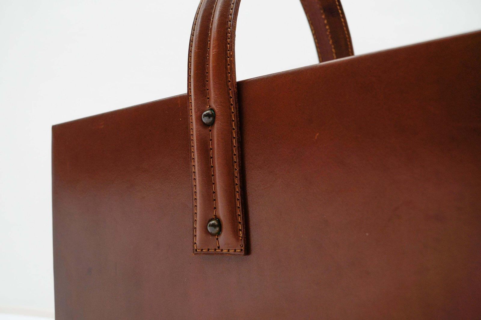 photo for sale Jacques Adnet Magazine Rack Made In Leather And Brass, 1950s