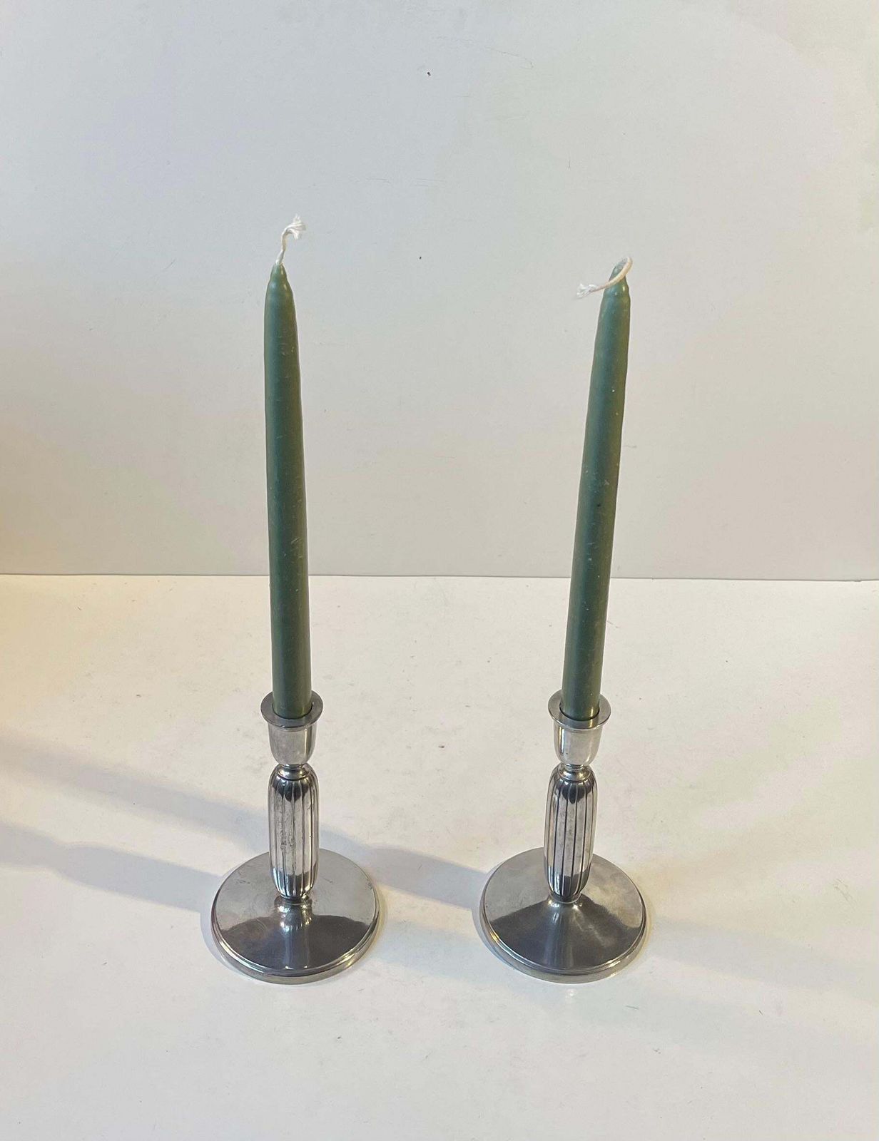 Just Andersen   A Pair Of Art Deco Column Candlesticks In Pewter, 1930s photo for sale